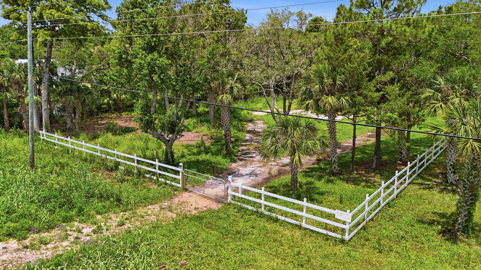 For buyers seeking that rare combination of scenic beauty and genuine peace, this expansive .53-acre parcel is truly one of a kind. Imagine waking to sunrises over the bay, enjoying afternoons sailing with the convenient boat launch across the street, and finally experiencing the calm you deserve. Whether you're envisioning a seasonal escape or your permanent sanctuary, this is the canvas you have been waiting for. The location strikes the perfect balance between serene natural surroundings and easy access to pristine beaches, waterfront dining, and vibrant community attractions, all without sacrificing that getaway feel. Create your ideal retreat with stunning waterfront vistas and seclusion. Bring your architect, bring your dreams, and make this elevated Florida lifestyle your own.