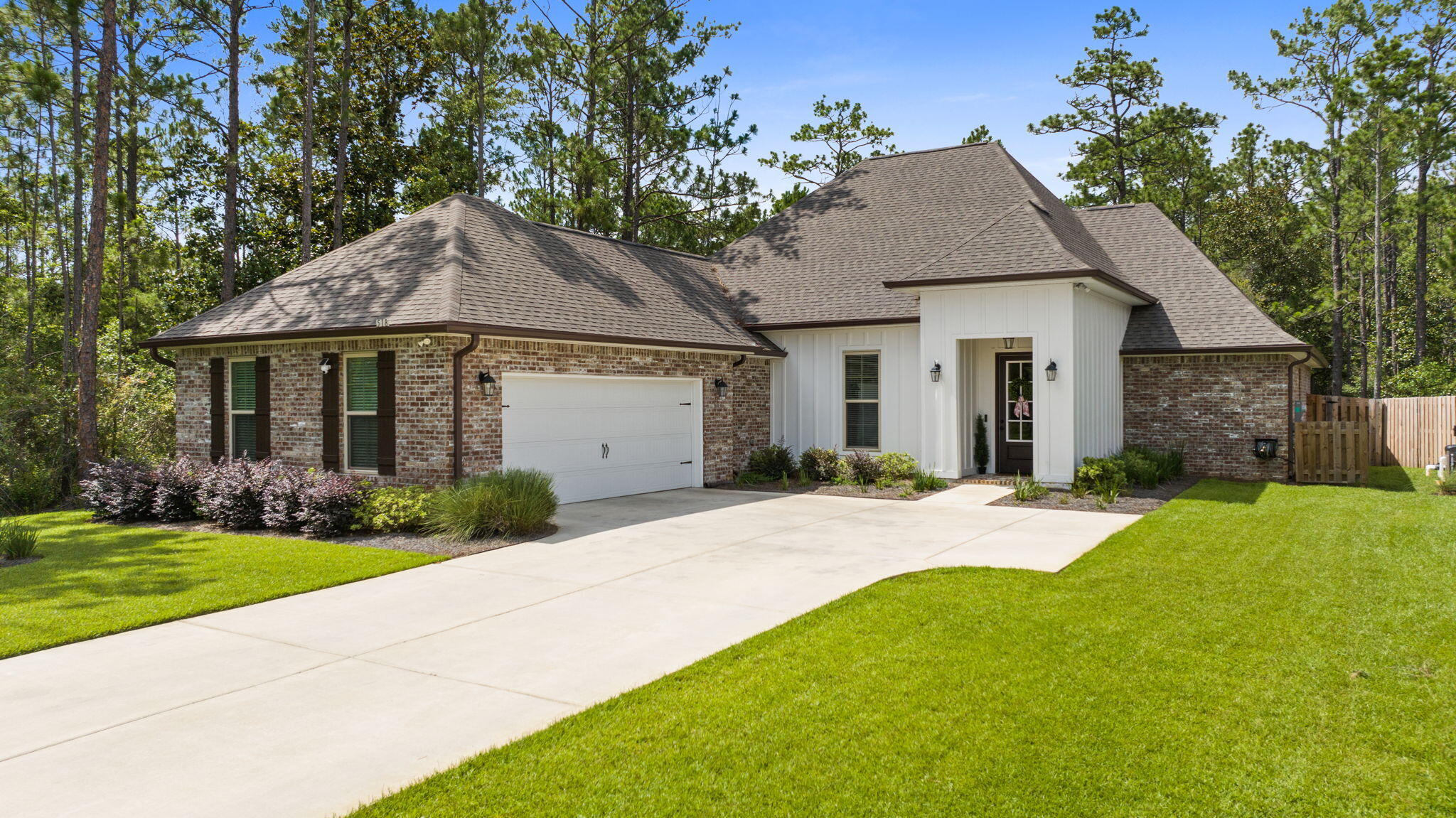 Twenty-two minutes from 30A Beaches, discover your oasis at 518 E Tweet Street in Hammock Bay, Freeport, FL!  Curb appeal abounds as you approach this beautifully upgraded 4-bedroom, 3-bath home offering approximately 2,442 square feet of comfortable living space! Move-in-ready, this elegant home perfectly blends modern enhancements with the serene lifestyle of a master-planned community. Thoughtful upgrades make this home truly stand out: whole house gutters for future durability, a spacious screened back porch ideal for relaxing evenings, an extended patio perfect for entertaining or outdoor dining, and a privacy fence that creates a secure, secluded backyard retreat. Additional improvements throughout elevate both comfort and style. Convenience meets luxury with the refrigerator, washer, and dryer all conveying with the property. The tranquil setting of 518 East Tweet is complemented by a large driveway providing ample parking and easy access. Enjoy peaceful surroundings while remaining connected to everything Hammock Bay offers. Hammock Bay residents enjoy unparalleled amenities across this stunning bayfront master-planned community and the Choctawhatchee Bay. Just five minutes away are the Creekside Clubhouse (with its resort-style pool, fitness center, pickleball, basketball courts, and more) and the Bayfront Clubhouse featuring breathtaking views, wrap-around porches, gathering spaces, and a 500-foot dock. Access all community perks: multiple zero-entry pools, tennis pickleball courts, hiking/biking trails, playgrounds, sports complex, full-time event coordinator, and more. Whether you're kayaking, gathering with neighbors, or unwinding by the water, this lifestyle delivers resort living every day. Located in Freeport, FL, you're minutes from 30A beaches, shopping, dining, and the best of Northwest Florida's Emerald Coast. Don't miss this rare opportunity in a private, amenity-rich setting. Schedule your private showing today and make 518 E Tweet Street your new home!