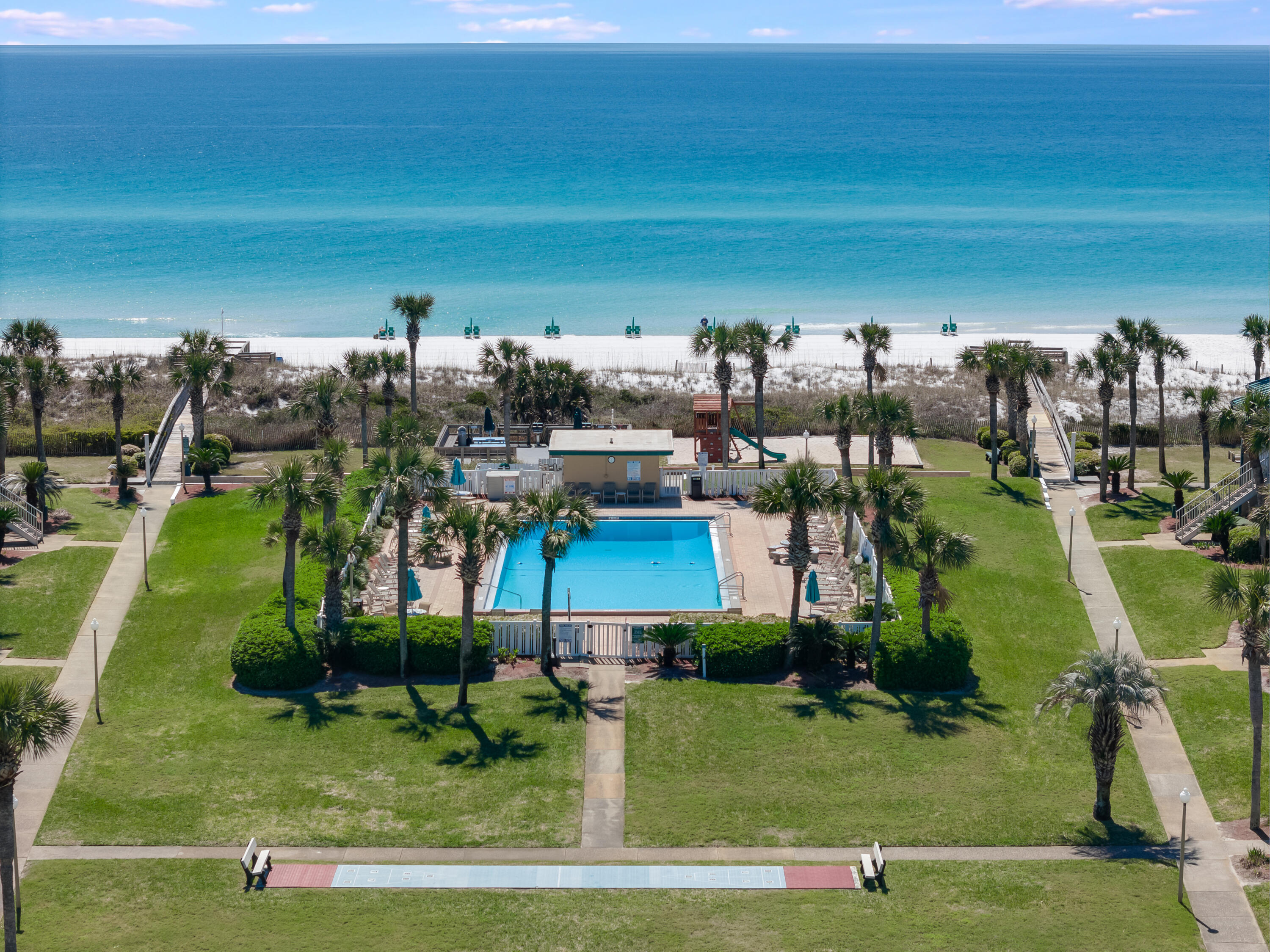 2 bed/1 bath condo located in the gated community of Seaspray on Okaloosa Island. This fully furnished unit has had most furnishings replaced in recent years, including new sofas in March 2026.  Enjoy peaceful Gulf views from your balcony, with convenient, private beach access just steps away.  The main level features an open-concept living, kitchen and dining area, while the bedrooms and full bath are located upstairs for added privacy.  Community amenities include a pool, sauna, clubhouse with full kitchen, fitness center, playground, picnic and barbecue area, and on-site laundry facilities.  Ideally situated just minutes from great restaurants, shopping, and entertainment. Currently operating as a vacation rental, this property offers excellent investment potential or would make the perfect personal beach getaway. Don't miss this opportunity!