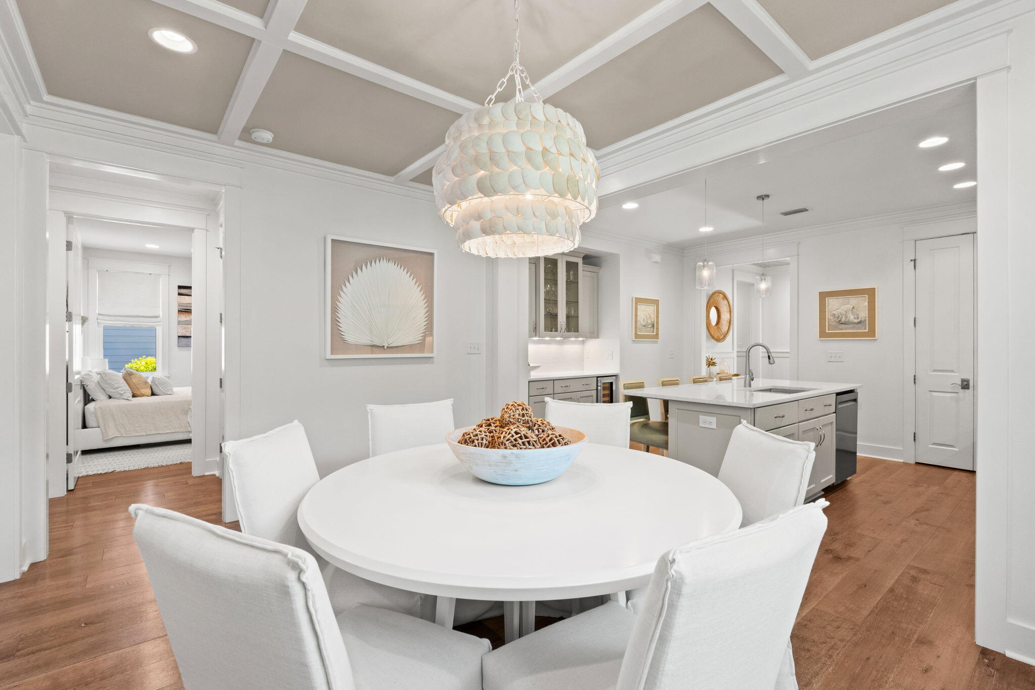 Welcome to refined coastal living in this turnkey, designer-finished retreat in Watersound Origins. This beautifully appointed Huff home blends timeless coastal style with elevated finishes, custom details, and a private outdoor oasis. Select designer furnishings are available, offering a seamless turnkey opportunity. Meticulously maintained, the residence is ready for effortless Florida living--just minutes from the beaches of 30A.

Nestled in a serene section of the neighborhood with charming gravel pathways that lead to community amenities, this thoughtfully designed and carefully maintained Huff home offers abundant privacy, ample natural light, an open floor plan, and high-end finishes throughout.

Featuring three spacious bedrooms with generous closets and three full baths, this home is designed for both comfort and functionality. The inviting living, dining and bedroom areas are
enhanced by ten-foot ceilings, rich hardwood flooring, custom wood ceiling details, and shiplap
accents that create a warm yet elevated coastal aesthetic. At the heart of the home, the chef's
kitchen showcases Cambria quartz countertops and backsplash, along with a seamless flow into
the main living space--perfect for everyday living and effortless entertaining. The spacious
primary suite serves as a serene retreat, featuring a wood ceiling that adds warmth and a sense of
luxury and relation, complemented by a spa-like bath and ample closet space. Additional
highlights include a remodeled laundry room and a garage with built-in cabinetry for added
storage and organization.
Step outside to enjoy a beautifully designed outdoor living space featuring a serene screened
porch, an expanded paver patio, and a lushly landscaped yard--creating a private and inviting
setting ideal for relaxing or entertaining guests.
Watersound Origins is renowned for its picturesque surroundings, world-class amenities, and
unmatched sense of community. Residents enjoy access to a par-3 golf course, kayaking and
paddleboarding in Lake Powell, a resort-style pool, tennis and pickleball courts, a state-of-the-art
fitness center, scenic walking and biking trails, and a vibrant Village Commons with regular
community events. Just a short bike ride or drive to the pristine beaches of 30A and the Gulf of
Mexico, this location offers the perfect blend of tranquility, convenience, and coastal lifestyle.
This exceptional home presents a rare opportunity to own in one of the area's most desirable
communities--where luxury finishes, thoughtful design, and an unparalleled lifestyle come together seamlessly.
