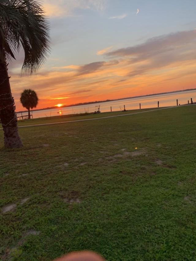 Waterfront lot that is a wow view, sunset and location.  Easy to get to Shell Island and the Gulf.  It has had major improvements since Hurricane.  New 326 ft dock with 2 boat lifts, Dock piling all new and dock raised approximately 2 ft and is extra wide for scooter, so was seawall and all of seawall redone from the water side. It has a new 6 x100 patio across water side of lot and a19x19 patio with electric and water.as well as dock.  Dock has double screws to make it stronger. There is a 3rd bay but has no lift.  It has extra pilings to tie up boats even a 55 ft boat.  Deep water.  It had tons of dirt added to lot to raise it up to the dock height.  New sidewalk.  House was removed after Michael.  House is in 3 flood zones.  House location is high and level.  House not flooded not even close and very little of yard was flooded by  Michael.  Lot was high and is now higher.  It has water, electric and sewer to lot.  Building does not convey.  This property has a front row seat to fireworks all over.   Hearing the taps at Tyndal is awesome.  Mexico beach just 20 mins away.   Buyer to verify any information that is important to them and schools