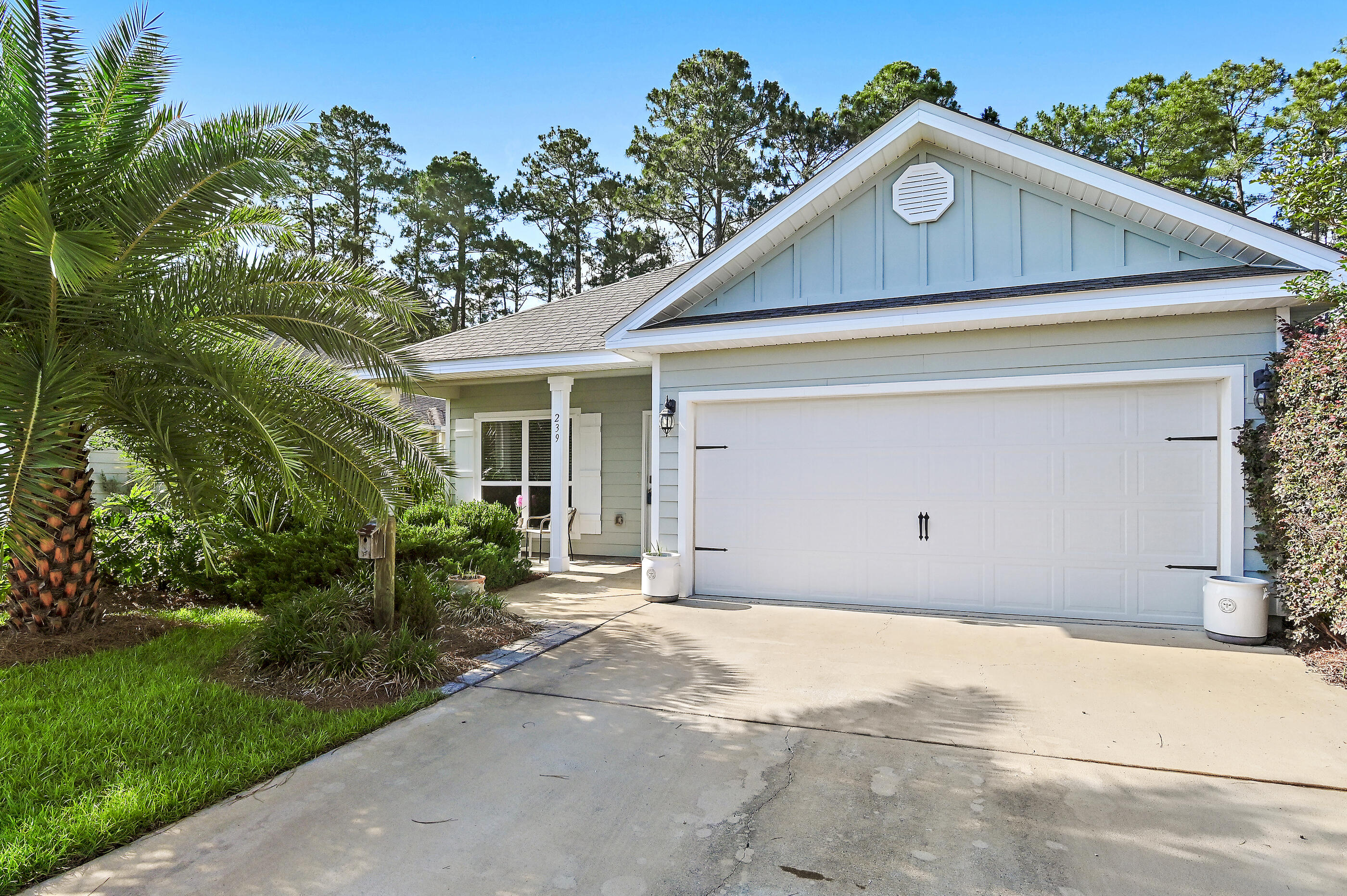 Welcome to 239 Southern Pines, a beautifully maintained 2019-built home that shows like new, nestled in a cul-de-sac within a peaceful, established South Walton neighborhood with only 36 homes. Meticulously cared for and in mint condition, this single-story residence impresses from the moment you arrive with professional landscaping featuring majestic Sylvester palms, a striking ponytail palm, and elegant dwarf pines.

Inside, enjoy an open-concept layout with 3 spacious bedrooms plus a flex room and a BONUS-enclosed north-facing sunroom. Use the flex space as a home office, hobby room, or additional sitting area while enjoying the extended living space filled with natural light. The home features granite countertops and vanities, low-maintenance engineered vinyl plank flooring, and fresh carpet in all bedrooms, giving the home a crisp, move-in-ready feel. The smart home package adds modern convenience and connectivity throughout.

The enclosed sunroom is a true bonus, perfect as a home office, reading retreat, or year-round entertaining space. This move-in-ready home also includes stainless steel kitchen appliances, including a like-new dishwasher, refrigerator, range, and over-the-range microwave, along with a fully equipped laundry room featuring a one-year-old washer and dryer. Step outside to your own private outdoor retreat. The fully fenced backyard showcases colorful crape myrtles in white, pink, red, and lavender, a graceful lace leaf Japanese maple, and manicured holly bushes, creating a serene, resort-inspired setting.

Located just minutes from the Emerald Coast beaches, the iconic 30A corridor, Ascension Sacred Heart Hospital Emerald Coast, Grand Boulevard at Sandestin, premier dining, and boutique shopping. Opportunities to purchase in this neighborhood do not come along often. Schedule your private tour today.