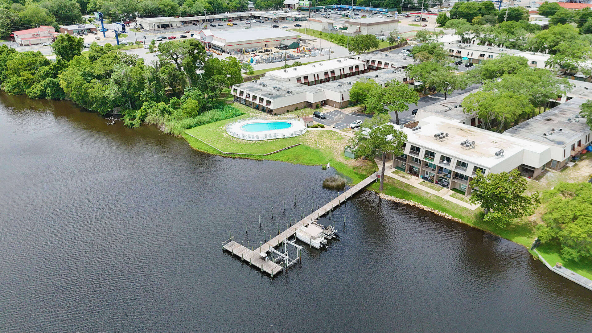 If you've been waiting for an affordable way to get on the water, this is it. This bayfront condo offers the kind of views and access that are getting harder to find at this price point. Whether you're looking for a second home, rental, or weekend escape, this one checks the right boxes.
Inside, you'll find a functional 2-bedroom layout with comfortable living space and natural light throughout. Step outside and enjoy direct access to the bay, complete with a community dock and peaceful setting that makes it easy to unwind. The community also offers amenities like a pool and on-site laundry for added convenience.
Located just minutes from beaches, bases, and everyday essentials, this is a smart buy for anyone looking for value and location. Opportunities like this don't come around often at this price--worth seeing in person.