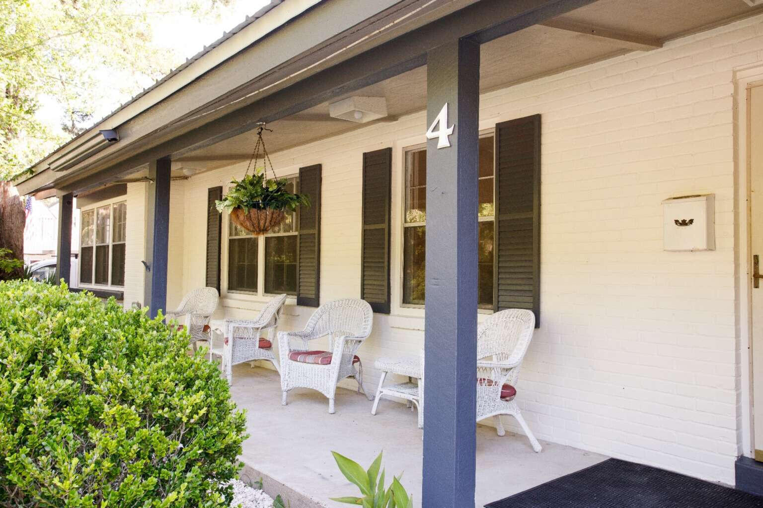 Rare Ferry Park multi-generational home with 4 bedrooms, 2 baths, and flexible bonus spaces in an established Fort Walton Beach location near Ferry Park, Uptown Station, Brooks Bridge, Fort Walton Beach Landing Park, and Hollywood Access Park. The home offers approximately 2,100 sq ft, a sweeping open-air front porch, enclosed back porch, backyard firepit area, mature trees, and native low-maintenance landscaping. Recent updates include interior paint and trim upgrades, refreshed kitchen, 2026 water heater, November 2024 high-efficiency HVAC heat pump, metal roof, R-30 blown-in attic insulation, and renewed transferable termite bond per seller. Interior layout offers flexible office, media, guest, kitchenette, or upstairs room possibilities. No HOA restrictions. Exterior utility includes double driveways, direct backyard access, turnaround area, high-clearance RV/boat storage pavilion with water and electrical hookups, detached workshop with utilities, three additional covered vehicle bays, and gravel parking for a full-size RV. Less than 0.5 mile to Walkedge Drive boat launch and minutes to Cinco Bayou and Okaloosa Island.