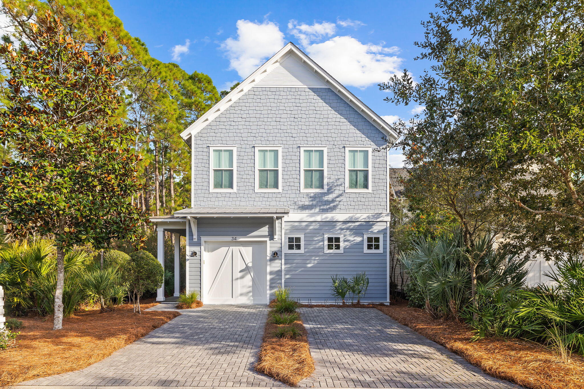 Inside the private community of Watersound West Beach, located on an end lot adjacent to a forest preserve, lies this 4-Bedroom 4 ½-Bathroom luxury home. Recently painted and decorated with designer finishes, the open floor plan offers 3 generously sized master suites and a bunk room, making this property ideal as a full-time residence, beach getaway or vacation rental. The first floor features a chef's kitchen with a large island, abundant cabinet space, stainless steel appliances and a recently replaced JennAir Range and Bosch dishwasher. The living room opens onto an expansive screened porch that exits onto one of many charming boardwalks that run throughout the community.

Residents of Watersound West Beach enjoy access to a range of exclusive community amenities, including a