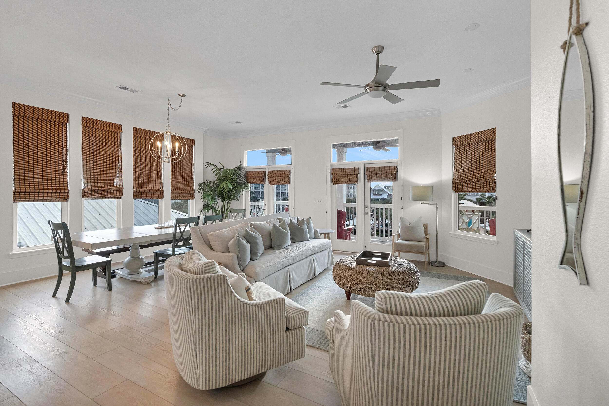 Welcome to this beautifully maintained, fully furnished three-bedroom residence in the heart of Seacrest Beach, ideally positioned near resort-style amenities and the soon-to-be-completed town hall--offering strong investment potential with up to $90K in gross revenue and the capacity to sleep 12. Designed for effortless coastal living, the home features designer furnishings, curated finishes, and a light-filled open floor plan. The main living area opens to a generous balcony, perfect for 30A's sunsets and Gulf breezes. The primary suite offers a private retreat with balcony access, double vanities, soaking tub, and walk-in shower. A generous secondary suite connects through a jack-and-Jill bath to a custom bunk room, ideal for guests or maximizing rental appeal. Generous owner's closet storage throughout provides valuable space for personal belongings -- a rare and practical advantage for second-home ownership.
On the ground level, a paved driveway leads to a spacious garage with ample room for vehicles, bikes, and beach gear. A convenient full bath just off the garage makes rinsing off after a day at the pool or beach effortless.
Nestled within the palm-lined community of Seacrest -- just moments from Alys and Rosemary Beach -- this home offers seamless access to premier dining, shopping, and entertainment. Enjoy the impressive Seacrest amenities, including private deeded beach access just a short two-minute stroll away, embodying refined coastal living at its finest.
With a strong rental history and excellent income potential, this property presents an outstanding opportunity for both investors and those seeking a second home along 30A.