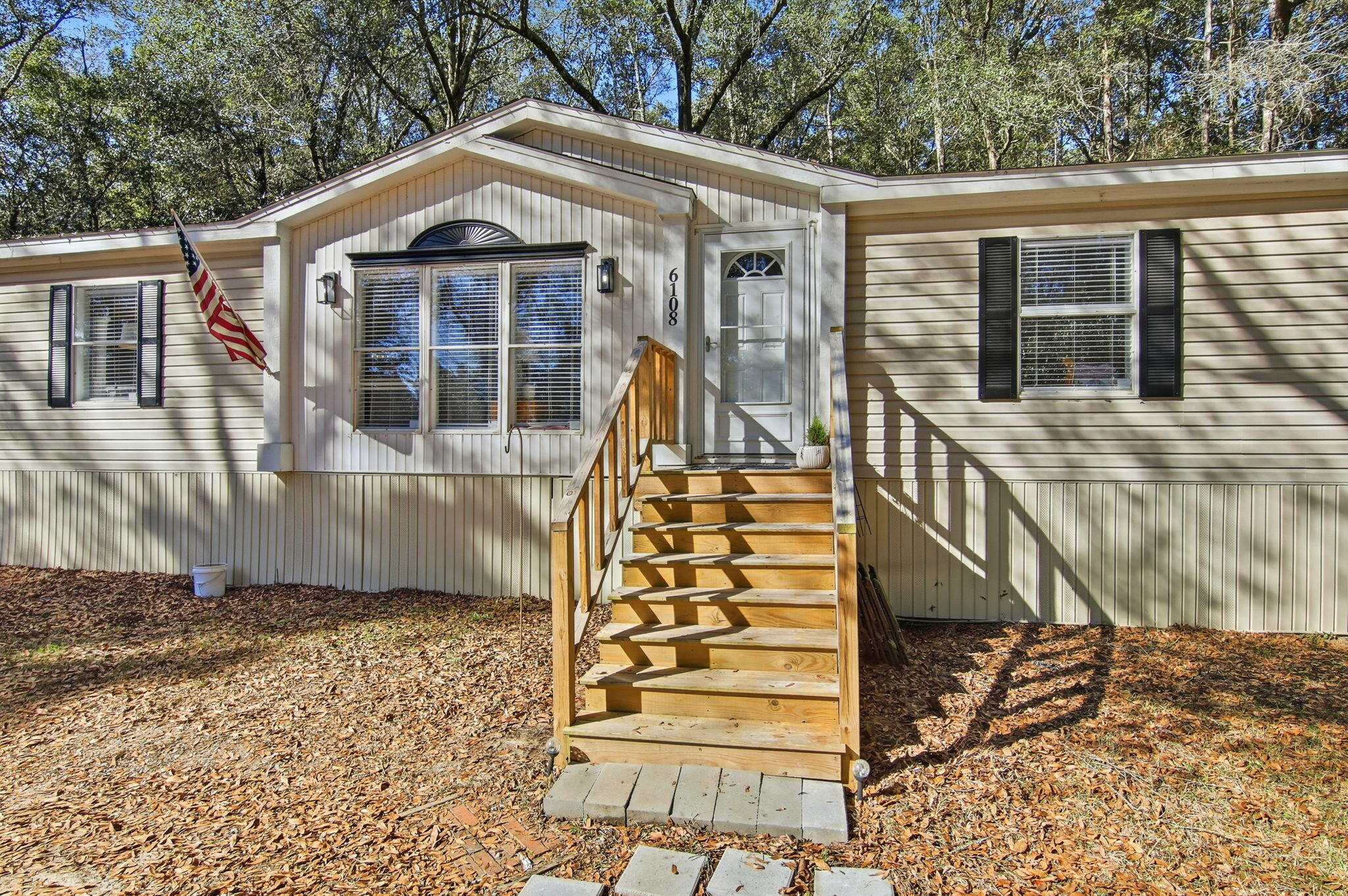 ***Sellers Offering $5000 towards closing costs with an acceptable offer***
Welcome to 6108 Old River Road, a magnificent manufactured home for sale in the peaceful Baker area of Florida, designed for the buyer seeking luxurious space and country serenity. This exquisite 3 bed 2 bath residence delivers the perfect blend of modern comfort and sprawling privacy, making it an ideal choice for a buyer ready to settle into their forever home.

Step inside the 1,876 square feet of fabulously updated living space where every detail caters to an elevated, relaxed lifestyle. You will immediately notice the beautiful LVP flooring that flows seamlessly throughout the entire residence, providing both elegance and easy maintenance. The layout is thoughtfully designed for family living or entertaining, featuring a spacious separate dining area perfect for holiday gatherings and a cozy breakfast nook bathed in natural light for everyday meals.

The luxury continues into the private primary suite, a true sanctuary away from the hustle of daily life. The ensuite primary bathroom is a spa-inspired retreat, complete with a huge soaker tub for ultimate relaxation, a separate shower, and a stunning double vanity that ensures morning routines are streamlined and effortless. Tucked away right off the primary bedroom is a den with an electric fireplace, creating warm and intimate ambiance for quiet evenings and maximum coziness. The two additional spacious bedrooms provide comfort for children or guests, and the updated second bathroom maintains the home's high standard of finish. 

The unparalleled feature of this Baker home for sale is the nearly an acre lot, offering vast outdoor space for play, gardening, and future expansion. This property delivers the highly coveted country feel, yet remains incredibly connected to the best of Northwest Florida. Military bases and the renowned white sand beaches of the coast are easily accessible, all within a beautiful 45 minute drive.

Beyond your private oasis, a desirable lifestyle awaits just minutes from your front door. Local convenience is found in the nearby Crestview area, offering a superb selection of high-end shopping and dining establishments within a short drive. For outdoor adventures and family fun, the stunning natural environment of the Blackwater River State Forest is in the heart of Baker, providing exclusive access to Florida's best hiking and nature trails. Additionally, the local Baker Park serves as a fantastic community hub, featuring fun, recreational spaces and picnic areas just minutes away.

This luxury manufactured home at 6108 Old River Road provides the perfect backdrop for your family's next chapter, offering space, style, and a peaceful environment without sacrificing access to modern amenities and Florida's spectacular coastline. This 3 bed, 2 bath residence awaits the buyer ready to experience the finest country living.