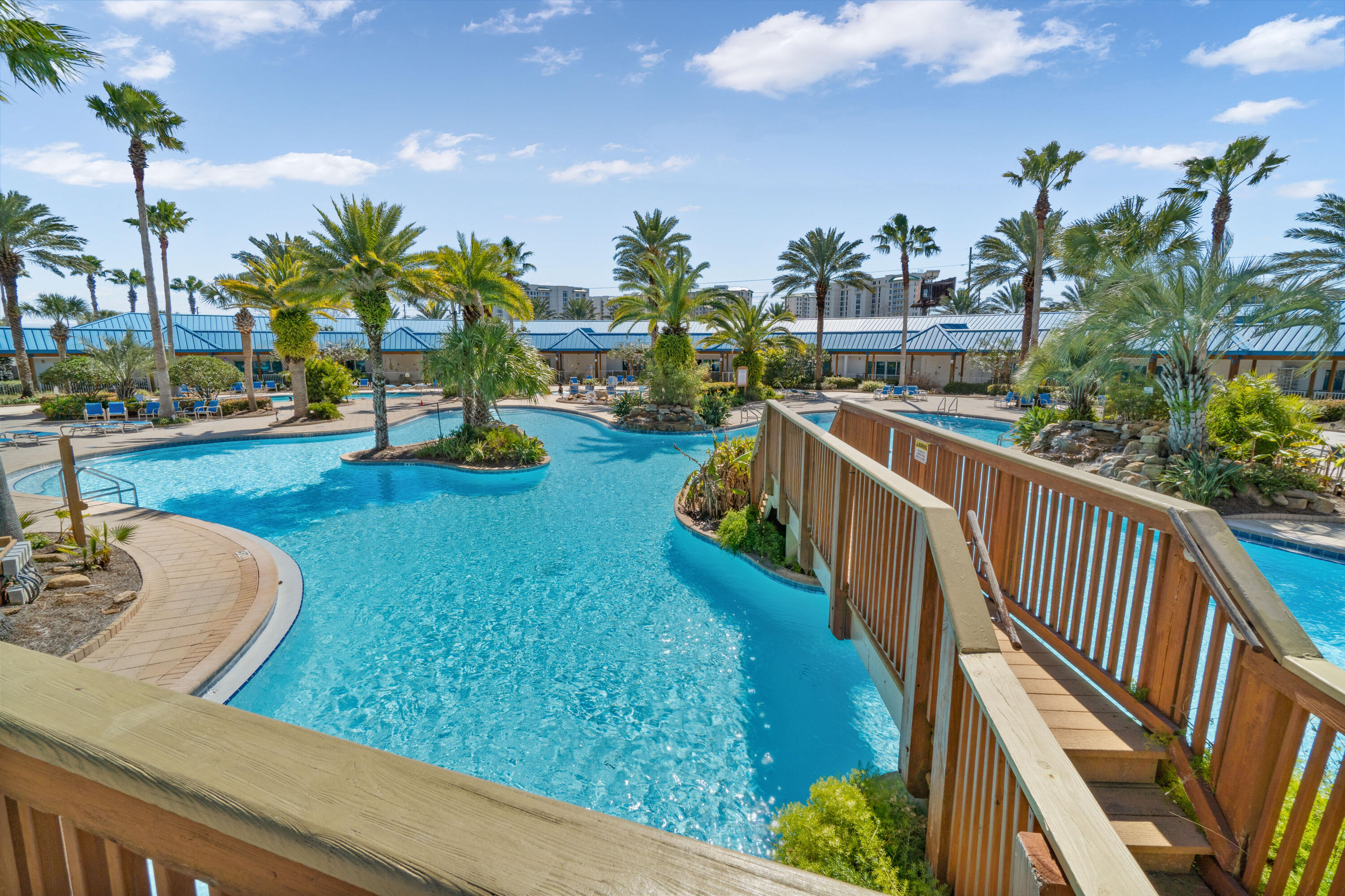 One of only 14 Poolside Villas, the Villa Cabana Dreamsis a Guest Favorite . With over $70,000K in rental income year over year, This 1480 sq ft of open concept walk in / walk out Pool Side Villa Cabana Dreams is a Rental Gem, with an amazing ROI! Featuriung double sliding doors that open to views of the tropical grounds & 11,000 sq ft Lagoon Style pool deck, 10ft ceilings! 5 Star Amenities. Upgrades galore,  LVP flooring, Washer/ Dryer,  1yr old HVAC,  New stove, Custom Drapes, Newer Furniture in Coastal Decor.  Separate Laundry room. Comes completely furnished, and turn key. Hit the ground running with an existing book of business with $38,000 in upcoming 2026 revenue! The Palms of Destin has a New State of the Art Gym,Indoor Pickleball court, BBQ Grilling Area, 11,000 sq ft pool deck with a lagoon style pool with waterfalls, islands, a secondary seasonally heated pool, a children's wading pool and a children's splash pad area. An onsite Coffee shop, a poolside Tiki Bar, and on site Restuarant. The palms offers a free beach shuttle across the street to June Decker Beach as well as water sports, shopping and dining locations. The Palms is in the heart of Destin, Surrounded by upscale restaurants; Ruth's Chris, Bubba Gump's, Joe's Crab Shack, and Peppers. This 5 Star resort offers a world class trip to vacationers and owners alike.