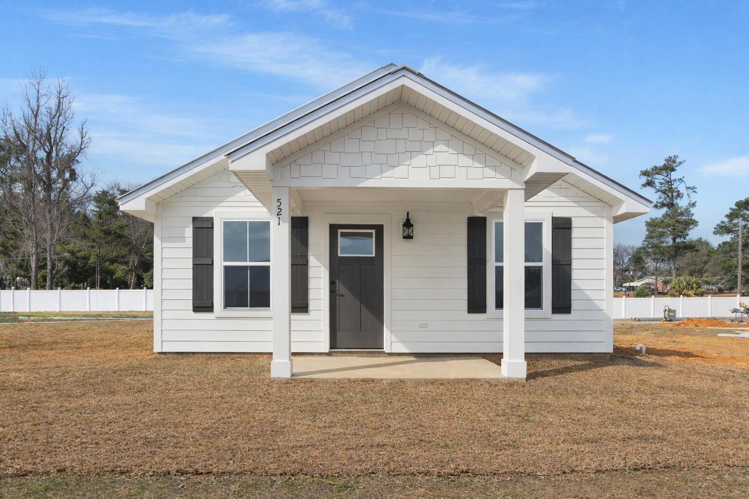 Tired of paying rent? HERE is a NEW house to call home!!! Located within the City of Florala, this great 3/2 home offers all laminate flooring, granite countertops, along with the appliances and a metal roof! Alabama allows you the opportunity to buy with lower insurance premiums and lower taxes! This home is low maintenance and has all the upgrades to include amazing white kitchen cabinets adding to the openness of the home. Home offers an open concept with living room, dining room, and kitchen all open perfect for entertaining. The laundry room located in the rear of the home also opens to the back yard, and deck, perfect for not tracking through your brand-new home!  Located on paved road! Home currently under construction. Pictures are of a previous house colors are subject to change.
