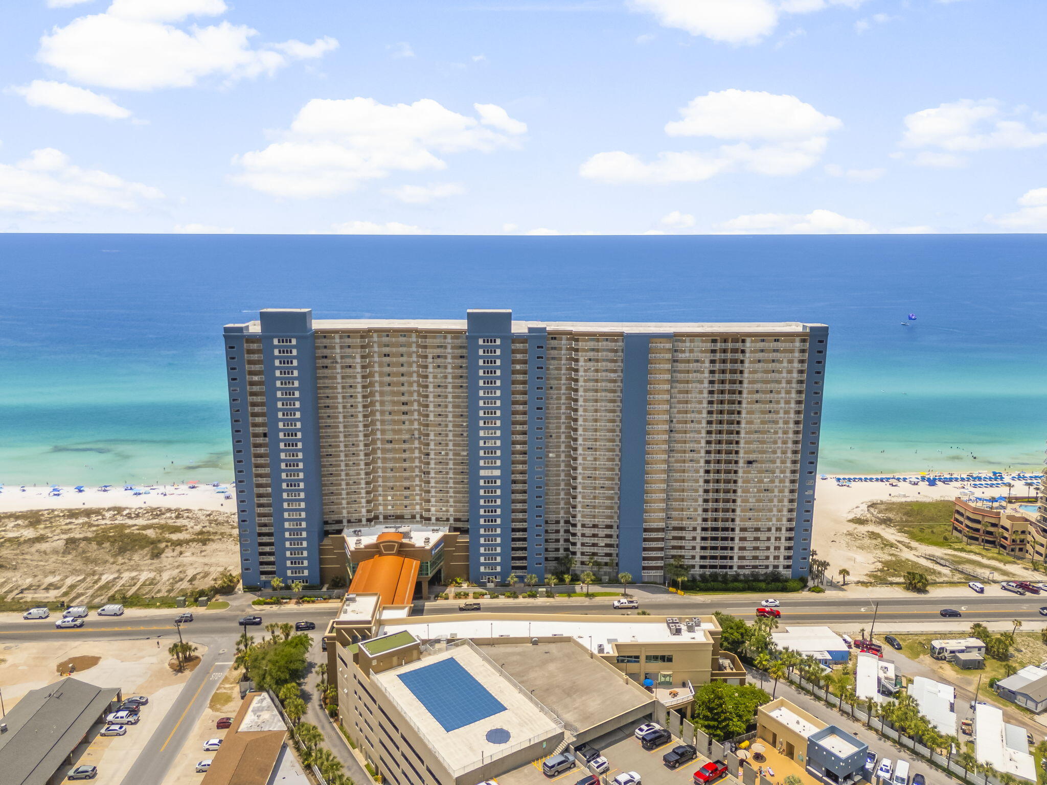 PRICE IMPROVEMENT at Emerald Beach Resort! This Gulf-front 2BR/2BA condo is now offered at an even more compelling price and presents an excellent opportunity for investors or second-home buyers. Featuring beautiful beach views, a refreshed coastal interior, and a guest-friendly layout, this unit is well-positioned for strong short-term rental appeal. The open living area flows to a private Gulf-front balcony, while the in-unit arcade game adds a fun feature guests love. Emerald Beach offers Gulf-front pools, hot tubs, fitness center, direct beach access, and a prime location near Pier Park, Runaway Island, shopping, dining, and entertainment. A strong blend of lifestyle, location, and income potential on Panama City Beach.