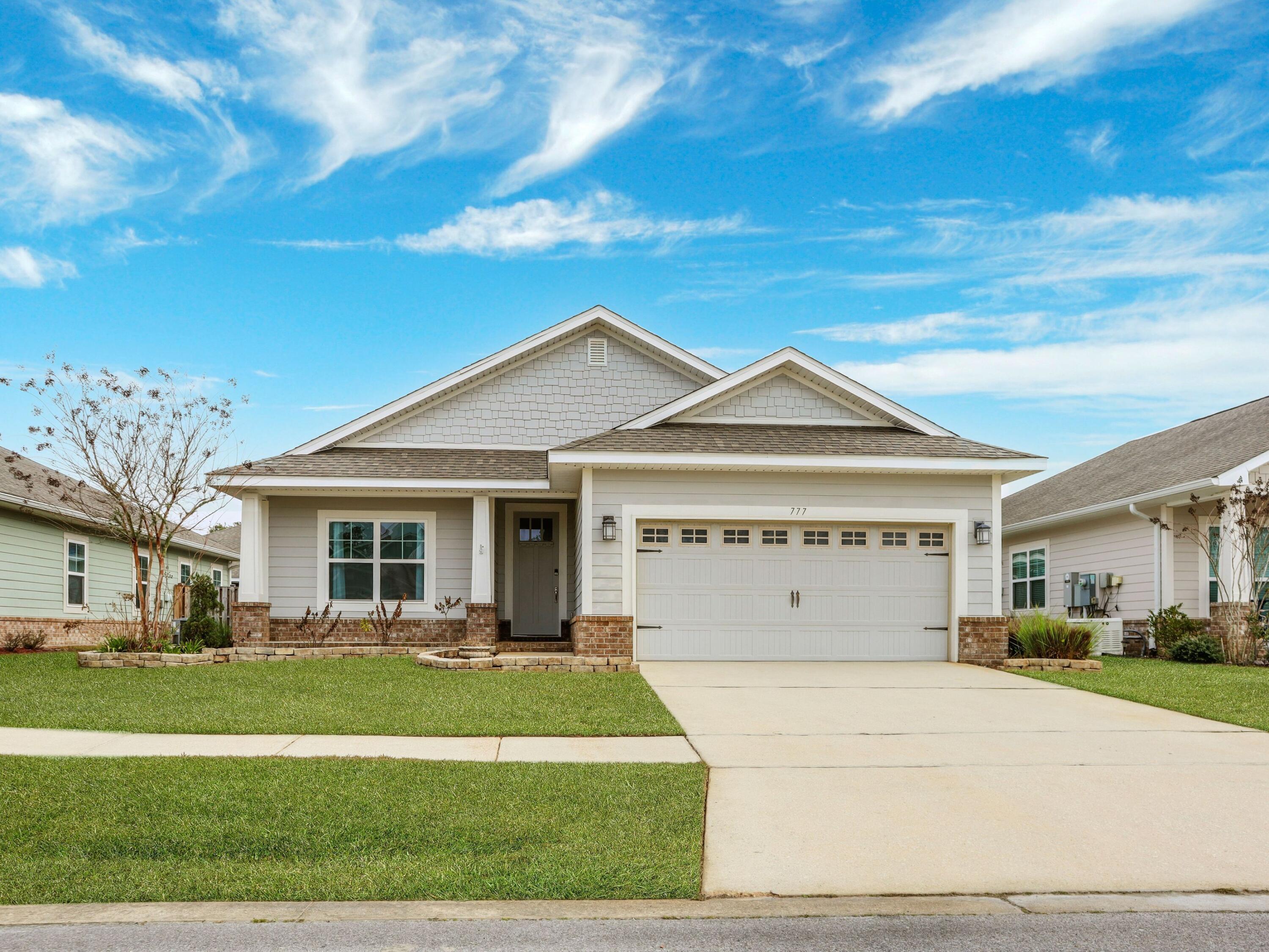 Located within the growing community of Lafayette Creek Landing, this newer construction home offers modern comfort in a prime Freeport location near the Publix complex. The 1,915-square-foot layout includes three bedrooms, two baths, and an open-concept design with tall ceilings and abundant natural light. The kitchen features crisp white cabinetry and sleek laminate countertops, while luxury vinyl plank flooring runs throughout for durability and style. The primary suite offers a relaxing retreat, and the covered back patio provides easy indoor-outdoor living. Community amenities include a pool, clubhouse, and dock with trail access to the creek. Just 15 miles from Blue Mountain Beach, this home offers convenient access to South Walton's beaches, dining, and shopping.