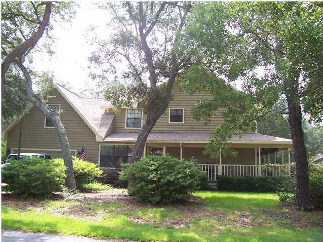 Large home with pool in a gated neighborhood?  Located in Southwind at Bluewater Bay.  This home is situated on a large corner lot with mature trees and shaded. Home is in need of repairs. Needs new HVAC unit downstairs, has the original roof, water heater is original as well. Home is being sold as is. All bedrooms are upstairs and siding does have some wood rot. Original roof, no leaks. Not VA or FHA approved. Conventional or cash buyers only.