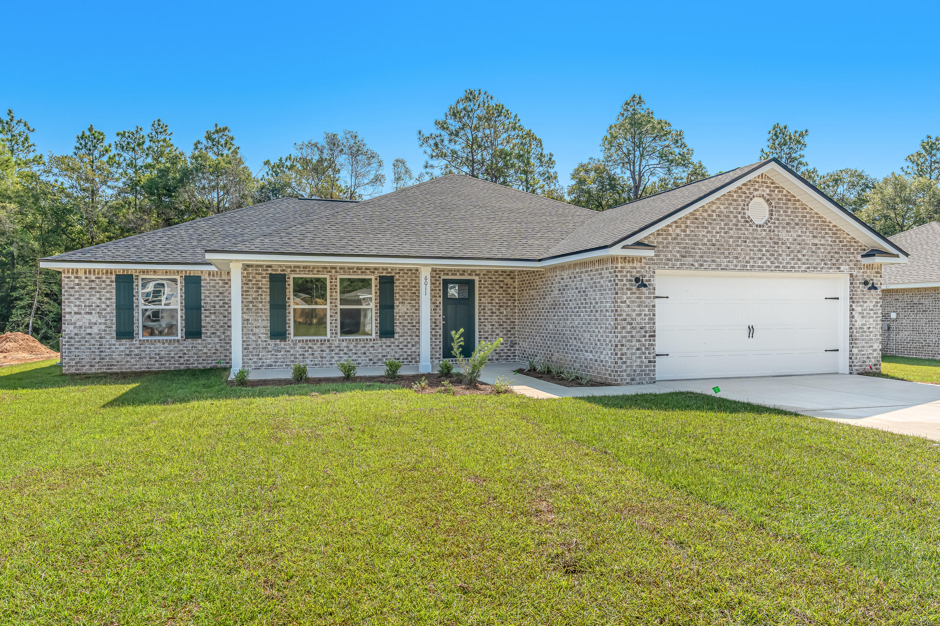 MID JUNE COMPLETION for this new home, $10,000 towards buyers closing costs/prepaids/rate buydown.  All brick construction, 'Sierra' floor plan features front & rear porches, split bedroom plan, finished garage.  Open living space, kitchen work island w/bar seating, cozy dining nook, white shaker style cabinets, mud room + laundry room.  Owner's bath & additional bath both have double vanities and linen storage.