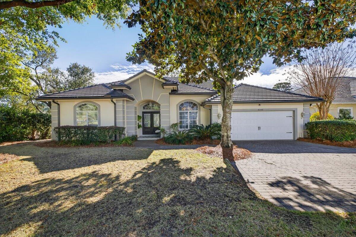 STUNNING remodeled 4-bedroom, 2.5-bath golf course home offering a private and serene setting in Sunset Beach at Bluewater Bay. This well-designed home features formal living and dining rooms, dedicated office space, a spacious family room, and a breakfast nook. 10-foot ceilings and a cozy fireplace with a shiplap surround add warmth and charm.

The beautifully updated kitchen offers white cabinetry, granite countertops, stainless steel appliances, and a center island for additional prep space. The spacious primary suite is a true retreat with a luxurious en-suite bath featuring a double vanity, soaking tub, and separate tiled shower. Step outside to the screened-in lanai and enjoy peaceful views of the 5th green and pond. Sunset Beach amenities include a clubhouse, pool, private beach, and dock. Bluewater Bay offers a convenient commute to the Mid-Bay Bridge to Destin, local military bases, shopping, dining, and A-rated schools.