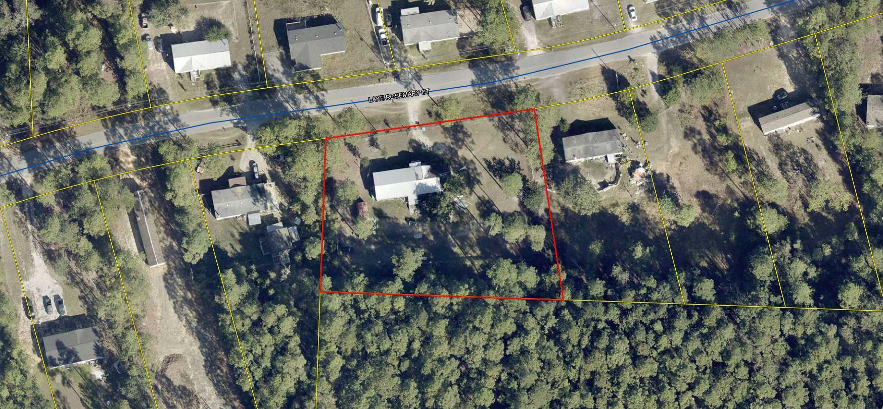 Fully fenced, almost full acre lot with water tap fee paid, septic tank and power in place. Vacant mobile home on property has extensive damage and needs to be removed. The mobile home is being given no value.