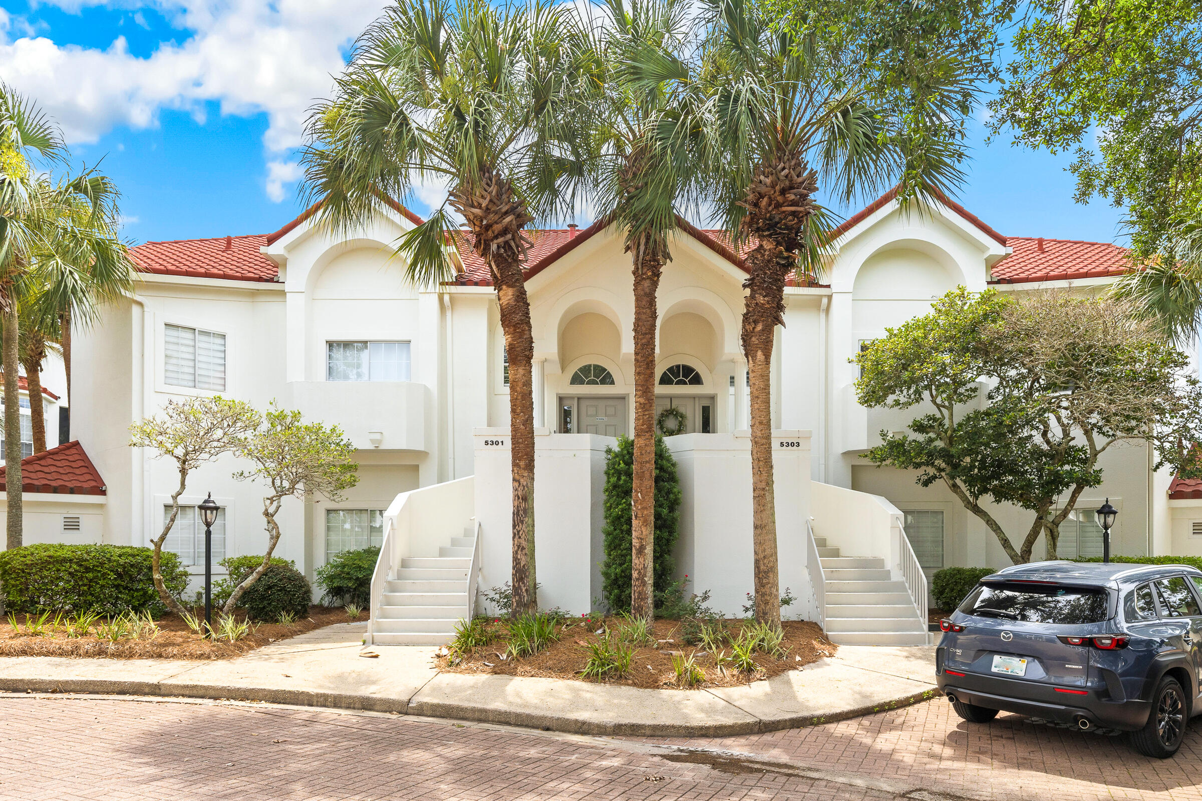 Experience the best of resort living in this beautifully renovated Tivoli villa, ideally situated within Sandestin Golf and Beach Resort. Offering 2,260 square feet of thoughtfully designed living space, This exceptional 3-bedroom, 3.5-bath residence with a spacious loft combines modern updates, generous accommodations, and exceptional rental appeal.

Nestled along the Baytowne Golf Course, the villa enjoys peaceful views of the 15th fairway. The spacious main living area is filled with natural light and opens effortlessly to a large screened porch, creating an ideal setting for morning coffee, outdoor dining, or unwinding after a day at the beach. Accessible from the living room, and primary suite, this inviting outdoor retreat serves as an extension of the home's comfortable living space.

The primary suite offers a relaxing sanctuary complete with dual closets and a well-appointed ensuite bath featuring a double vanity, and walk-in shower. Two additional guest bedrooms and two nearby full baths provide plenty of room for family and guests, while the upstairs loft includes its own private half bath, offering added flexibility for additional sleeping quarters, a second living area, or home office space.

Additional features include new flooring throughout, a large owner's closet, dedicated golf cart parking, and a like-new 4-seat golf cart that conveys with the property.

Owners and guests will appreciate the convenient location just moments to the seasonally heated Tivoli pool and Sandestin's pristine sugar-white beaches. Tivoli by the Sea residents enjoy front-door parking, curbside trash service, and easy access to the resort's championship golf courses, tennis facilities, marina, dining, shopping, entertainment, and miles of scenic pathways. Whether you're searching for a primary residence, vacation retreat, or investment property, this exceptional villa delivers the ultimate Sandestin lifestyle.

As an introduction to the Sandestin lifestyle, we invite our new owners to explore amenities that make Sandestin special. The listing brokerage and seller(s) are presenting the buyer(s) of this property with (2) 90-minute rounds of Tennis court time, a golf foursome at one of our three championship courses, and a round of golf for up to four (4) players at the unrivaled Burnt Pine Golf Club.

Sandestin Golf and Beach Resort features more than seven miles of beaches and pristine bay front, four championship golf courses, 15 world-class tennis courts, a 226-slip marina, a fitness center, spa and celebrity chef dining. Shop, dine and play at the charming pedestrian village, The Village of Baytowne Wharf and more. Inside the gates of the resort, residents enjoy a balanced lifestyle of high-class living, spanning the 2,400 acres from the beach to the bay. Everything within the gates of the resort is accessible by golf cart or bicycle. The entire resort is interconnected by miles of pedestrian, bike and golf cart paths that weave through groves of live oaks, meandering past natural lagoons, fountains, man-made lakes, and meticulously landscaped fairways.