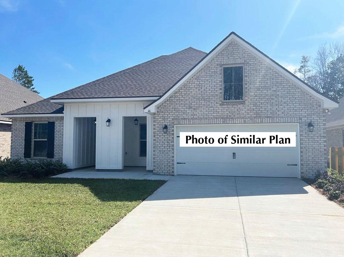 Awesome builder rate plus choose ONE free: window blinds OR fridge! Restrictions apply. 

The HICKORY III G in Starburst at Hammock Bay community offers a 5BR/3BA open design with formal dining room and separate den. Upgrades added (list attached). Features: double vanity, garden tub, separate custom tiled shower, and walk-in closet in master bath, kitchen island, walk-in pantry, boot bench at garage entry, covered porches, crown molding, recessed lighting, smart connect Wi-Fi thermostat, smoke and carbon monoxide detectors, landscaping package, architectural 30-year shingles, flood lights, and more! Energy Efficient Features: water heater, electric kitchen appliance package, vinyl low E windows, & more! Energy Star Partner.