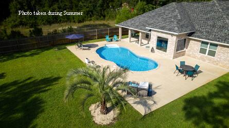 ~ONLY 4 MILES to the BEACH and Less than 1 Mile to East River Boat Ramp!~ Beautiful 2018 Built Craftsman Style Home w/Saltwater Pool in FAST Growing Navarre, Florida! Upgrades & Features Include:  Salt Water Pool / Large Covered Patio & Outdoor Entertainment Area / 4 Bdrm / 2 Bath / 2 Car Garage / Oversized Parking for Cars & Toys / Granite Counters / Kitchen Island / Breakfast Bar / Stainless Steel Appliances / 2 Walk-In Pantries / Trey Ceilings / Wood Look Tile / Hurricane Protection / Brick Exterior / Hybrid HWH / Sprinkler System & Lawn Pump/ No HOA. The Master Bathroom has Double Vanities / Tiled Shower with Rain Shower Head / Garden Tub / Large Walk-in Closet.  The Large Laundry Room has entry into the Master Closet for your convenience and includes Washer & Dryer.  Ideal Location.. close to Shopping / Restaurants and only 4 Miles to the most Beautiful BEACHES on the Emerald Coast and all the FUN this area has to Offer.  Boat Ramp access is less than 1 Mile away with EASY access to East River and East Bay! Don't miss your chance to Purchase your Own Little Paradise in "Florida's Most Relaxing Place"! Buyer to Verify all Dimensions and Info.