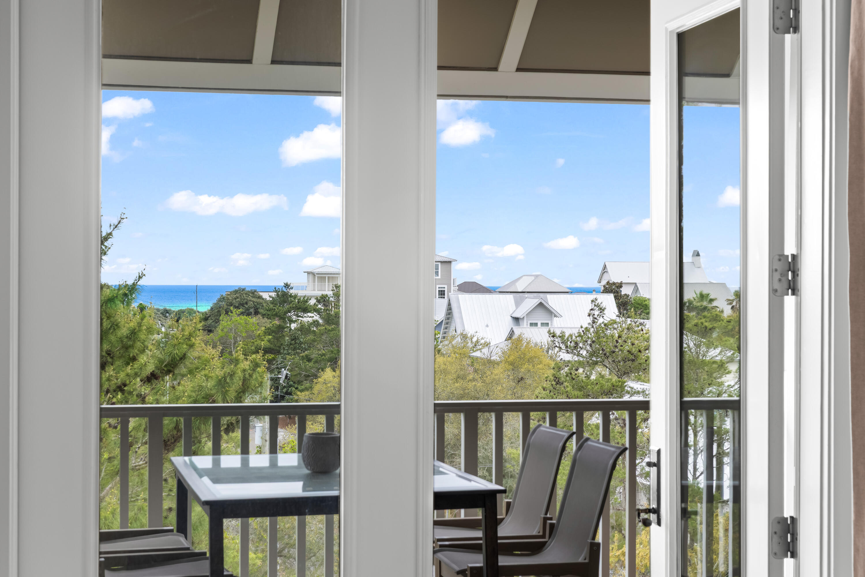 Top-floor M2 building condo with Gulf views in Redfish Village. This well-kept 2BR + hallway bunks floor plan offers an ideal layout for both personal use and rental flexibility. Enjoy a bright, open living space that flows onto a private balcony overlooking the treetops with a peek of the Gulf.
The kitchen features granite countertops, stainless appliances, and bar seating, opening seamlessly to the dining and living areas. The primary suite is spacious with a large bath, while the guest bedroom and built-in bunks provide comfortable accommodations for family and guests.
Never rented and meticulously maintained, this unit presents a rare opportunity for a true second-home feel in one of 30A's most sought-after communities.
Redfish Village amenities include private deeded beach access with with seasonal shuttle, resort-style pool, owner's lounge, and fitness room. All just a short walk to Blue Mountain Beach dining and shops.