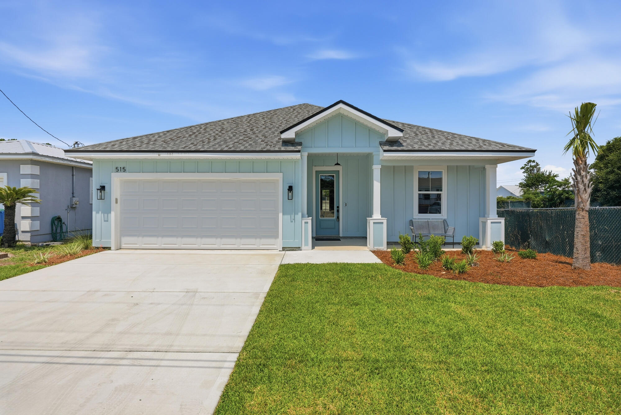 Brand-New Construction | No HOA | STR-Friendly | Minutes to the Beach!
Welcome to 515 Pinetree Drive, a beautifully crafted new construction home completed in 2025, offering the perfect blend of modern coastal design, functionality, and investment potential. Whether you're searching for a primary residence, second home, or income-producing vacation rental, this 4-bedroom, 2-bath home checks all the boxes.

Step inside to discover 1,750 square feet of thoughtfully designed living space featuring soaring 8-foot interior doors, luxury wide-plank flooring, recessed lighting, and an open-concept floor plan ideal for entertaining and everyday living.

The chef-inspired kitchen is the centerpiece of the home, showcasing a large quartz island, striking two-tone cabinetry, stainless steel appliances, designer tile backsplash, and elegant pendant lighting. The spacious living and dining areas flow seamlessly to the covered rear patio, creating the perfect indoor-outdoor lifestyle.

The private primary suite offers a spa-like retreat with quartz countertops, designer fixtures, dual vanities, and a luxurious walk-in shower with frameless glass enclosure. Three additional bedrooms provide flexibility for guests, family, or a home office.

Outside, enjoy a fully privacy-fenced backyard with plenty of room for pets, entertaining, or future outdoor enhancements. Located just minutes from the white sugar-sand beaches of Panama City Beach, Pier Park, Frank Brown Park, shopping, dining, and entertainment, this move-in-ready home offers the rare opportunity to own a low-maintenance property in one of the area's most desirable short-term rental corridors.

Whether you're looking to generate vacation rental income or simply enjoy the Florida beach lifestyle, 515 Pinetree Drive delivers exceptional value, style, and flexibility.