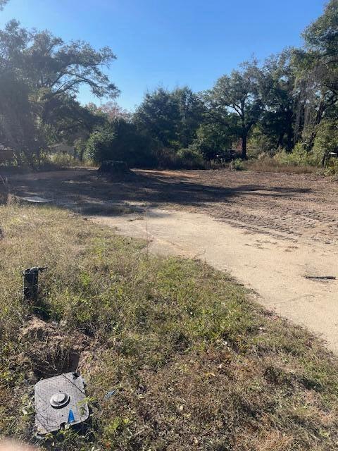 Prime development opportunity in the heart of Crestview! This 0.2-acre parcel offers exceptional flexibility for builders, investors, or homeowners looking to create something unique. Zoned to allow for multiple uses, the property can accommodate up to 2 townhomes, making it ideal for small-scale multifamily development or custom single-family homes. Possible owner financing available.