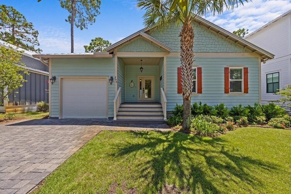 Welcome to this charming 3-bedroom, 2-bathroom Southern-style coastal cottage located in the gated community of Hidden Grove in Santa Rosa Beach. Boasting an open-concept single-level floor plan, this home features high tray ceilings, beautiful hardwood flooring, and hurricane-rated impact windows and doors throughout. The light-filled kitchen comes fully equipped with granite countertops, custom cabinetry, and stainless-steel appliances, while the primary suite offers a spacious retreat complete with a large walk-in closet and a glass-enclosed shower. Outside, enjoy low-maintenance coastal living with a inviting front porch, a private Trex deck, a fully fenced backyard, metal roof and a one-car garage. Situated in Flood Zone X (no flood insurance required). Enjoy the neighborhood community pool, all while being just minutes from the bay, public boat launches, Grand Boulevard shopping and dining, and the white sand beaches of Scenic Highway 30A.