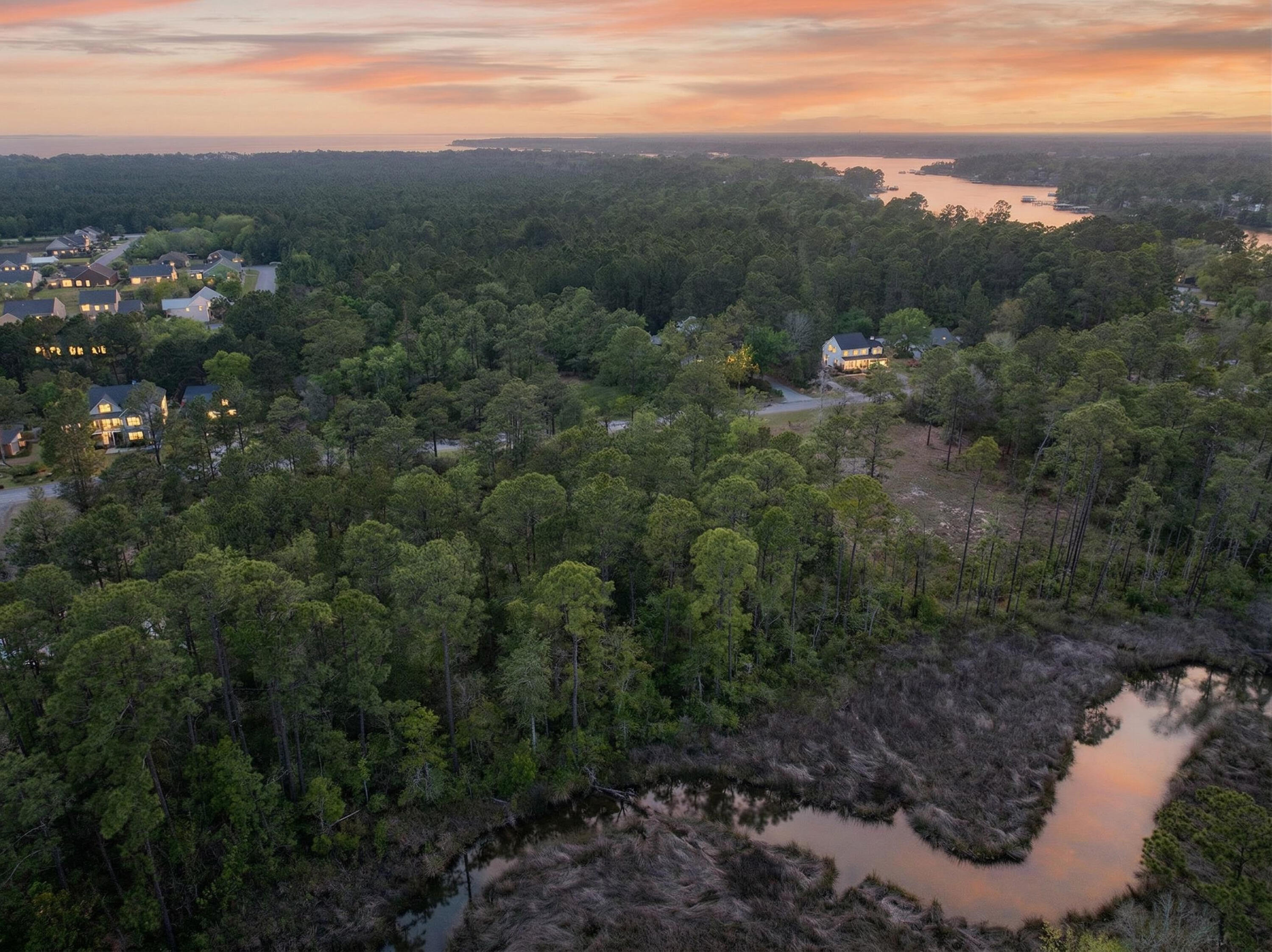 Discover the perfect blend of privacy, space, and waterfront living with this stunning 0.68-acre bayou front lot. Featuring 90 feet of water frontage, this property offers endless possibilities to design your dream home exactly how you envision it.

The lot is beautifully wooded, allowing you to customize your surroundings, clear as much or as little as you'd like to create the ideal balance of open space and natural privacy. Whether you're dreaming of peaceful mornings overlooking the bayou or a custom retreat designed for entertaining, this property delivers the canvas to make it happen.

And it gets even better, additional acreage is available. Lots 8 and 9, offering an extra 1.6 acres, can be purchased to expand your waterfront estate or investment opportunity.