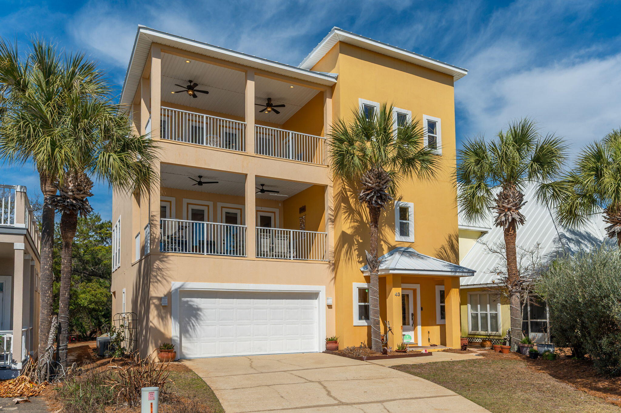 Located in the gated community of Maravilla & tucked away in a quiet cul-de-sac you'll find this spacious beach retreat. With Deeded Beach access, this is an unbeatable location. Enter into the foyer and you're greeted with a grand staircase that is one of the standout architectural features of the home. Inside you'll find a spacious main living area that includes multiple seating areas, a chef's dream kitchen and dining area large enough for almost any gathering. As your eye begins to catch subtle design details, you'll start to feel just how special & thoughtfully designed this home is. Other features include deep, shaded porches & 4 bedrooms with ensuite baths, with 1 of the bedrooms being a 465 sq.ft. bunkroom that is large enough to be its own separate living area.  Community amenities include private pool, gated access, over 500 feet of deeded beach access, tennis, pickleball, and pool/clubhouse. Although it would make an excellent rental property, this custom home has never been on a rental program and the pride of ownership shows as it is in immaculate condition!