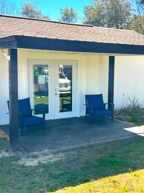 Located 5/10th of a mile from Downtown DeFuniak Springs, along a shaded sidewalk down Live Oak Avenue, you will find this small but quaint office building. Great opportunity for a coffee shop, barber shop, office, studio or retail store. Just across the tracks are USPS, DFS City Police Dept. and DFS City Hall. The block building is situated along the east side of a double lot, so there's room to grow. The property is currently used as a Martial Art Studio, so if that's your interest; it's turnkey ready.