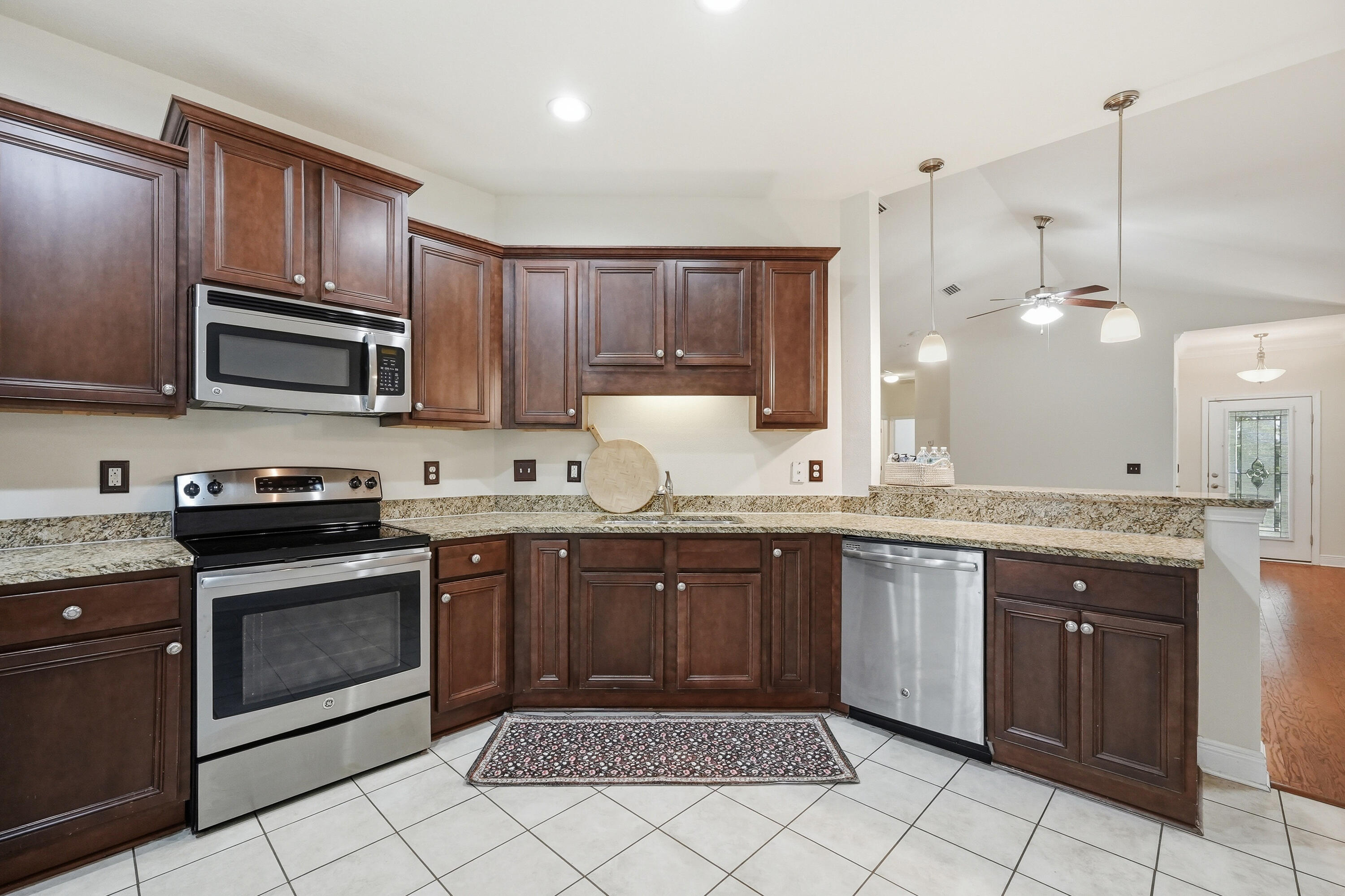 Imagine waking up each morning to the peaceful ambiance of LaGrange Landing, one of Freeport's most charming and amenity-rich communities. This beautifully maintained 2016 built home offers 3 bedrooms, 2 bathrooms, and an attached sun porch where you can sip your morning coffee and soak in the Florida air without a care in the world.

Hardwood flooring flows through the main living area and primary bedroom, creating a warm and inviting atmosphere the moment you walk through the door. The spacious eat-in kitchen with tile flooring and gleaming granite countertops is the kind of space that naturally becomes the heart of the home, whether you are hosting Sunday brunch or a casual weeknight dinner. When the day winds down, step onto your sun porch and let the stress of the day melt away.

Outside, a low-maintenance yard means your weekends are yours to enjoy, and enjoy you will. LaGrange Landing's private dock gives residents direct paddleboard and kayak access to the Choctawhatchee Bay, and the community pool is just a short stroll away. This is not just a neighborhood; it is a lifestyle.

Location could not be more convenient. Tucked just behind the Publix shopping center and situated off Highway 20 with quick access to Highway 331, everything you need is within minutes, from boutique shopping and dining in South Walton to everyday errands right around the corner.

This is Florida living done right.