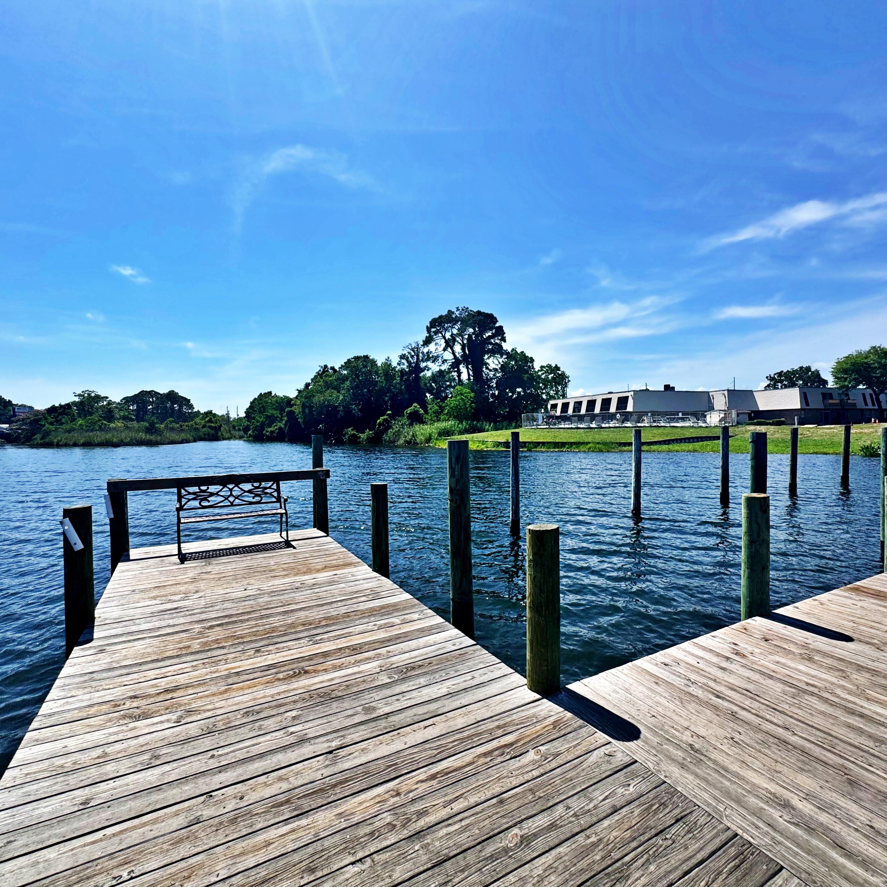Welcome to Pier One Condo! This second-floor 2-bedroom, 1-bath condo offers 925 sq ft of comfortable living space with a private balcony overlooking the bayou. The layout features a dining area with balcony access, tile flooring, central heat and air, and kitchen appliances including dishwasher, disposal, microwave, and electric stove/oven. Enjoy community amenities such as waterfront access, dock, pool, tennis court, and on-site laundry. Conveniently located off Beal Parkway, close to shopping, dining, schools, and an easy drive to Hurlburt Field, Eglin AFB, downtown Fort Walton Beach, and the beaches. Great opportunity for a primary residence, second home, or investment property. Buyer to verify all dimensions, HOA details, rental restrictions, and any information deemed important.