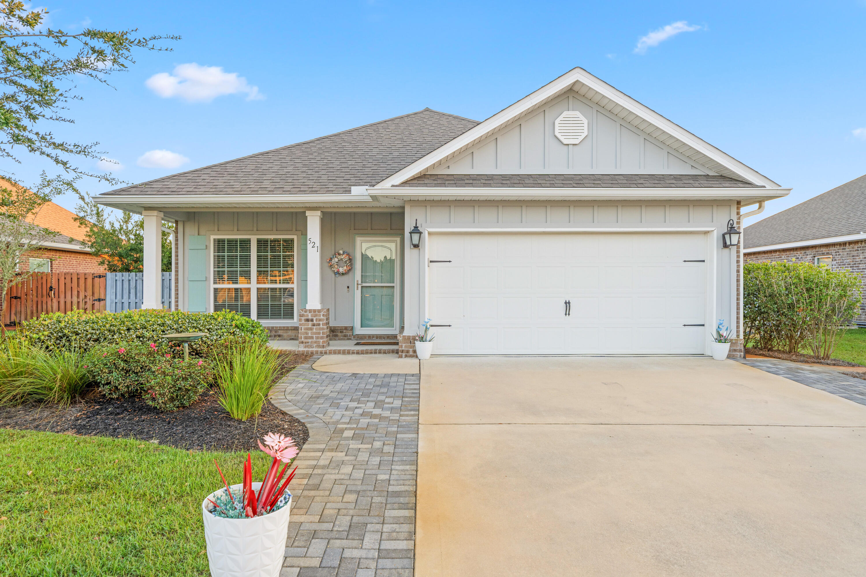 MAJOR PRICE CHANGE!  Welcome to this immaculate three bedroom plus bonus, two bathroom home in the coveted master-planned community of Hammock Bay.  Looking for a pet-friendly neighborhood with large sidewalks, two zero-entry swimming pools, large workout gym, pickle-ball courts, kid-approved playground, general store, brewery, food trucks and even a new dental office that you can walk to?  You've found it!  This open concept floor plan with new skylights, new storm door, new screened in porch, new master bathroom shower, and new guest bedroom ceiling fans, offers natural light to welcome you home.  The well-groomed backyard provides a quiet place for you to enjoy all that Florida offers.  Schedule a viewing today for this turn-key, move-in ready home!