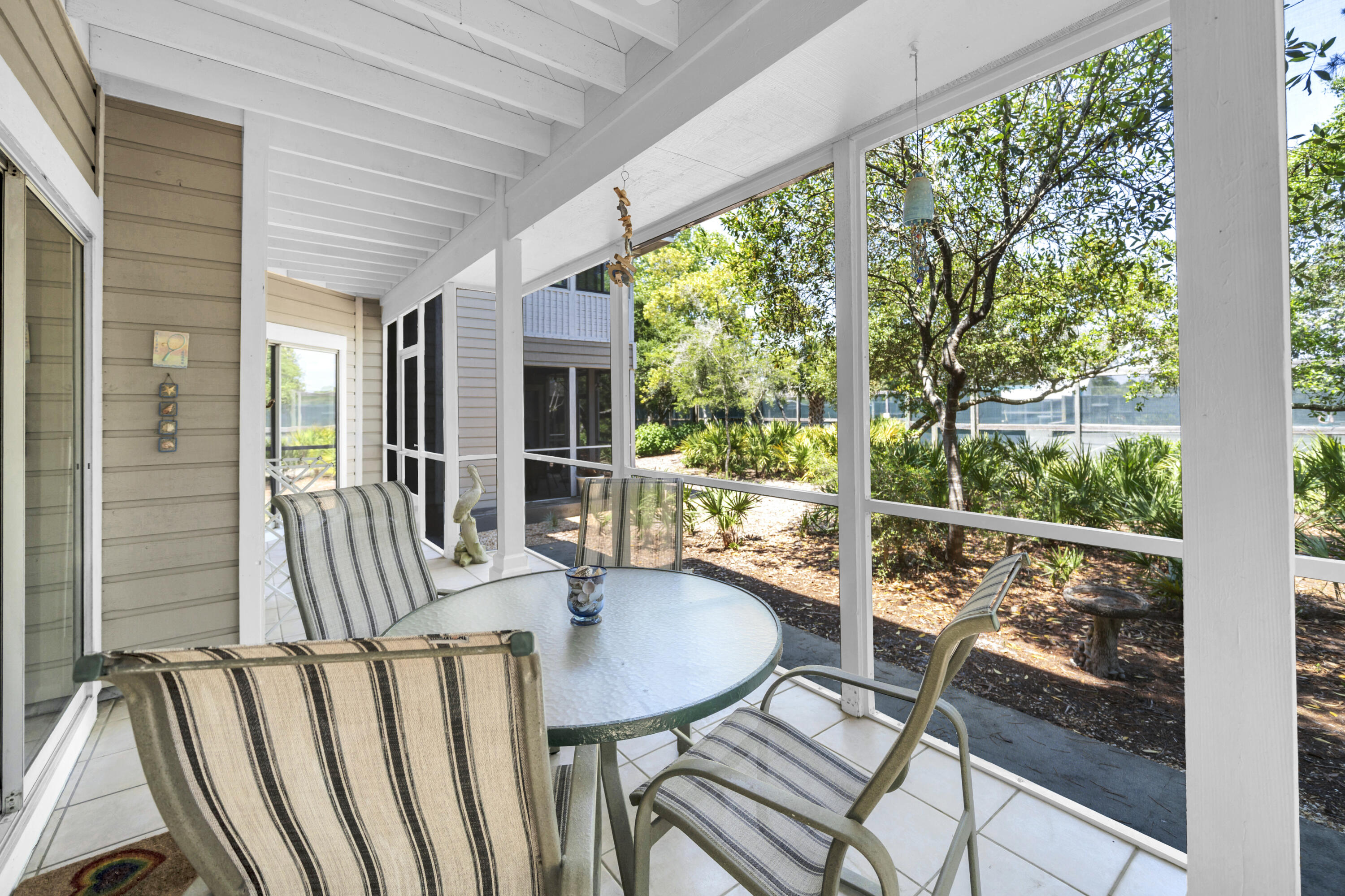 Discover one of the most desirable cottages available in Hidden Dunes! This beautifully updated first-floor 2-bedroom, 2-bath condo offers an unbeatable combination of location, convenience, comfort, and investment potential. With easy ground-level access and no stairs to climb, this cottage is ideal for owners and guests of all ages, making arrivals, departures, beach days, and everyday living simple and convenient.
Located just steps from the beach access--the closest cottage location in the community--you'll also enjoy convenient access to the community pool, gazebo, gas grills, playground, and lighted basketball courts. Hidden Dunes spans 27 lushly landscaped acres and features exceptional amenities, including six meticulously maintained Rubico clay tennis courts, pickleball courts, and ample parking throughout the resort.
Inside, the cottage has been completely renovated with attention to detail. Updates include new flooring, fresh interior paint, remodeled kitchen and bathrooms, and stylish new furnishings throughout. The open-concept layout creates a bright and welcoming atmosphere, while the charming front porch and large screened back porch provide the perfect spaces to unwind and take in the beautiful surroundings.
Whether you're searching for a vacation getaway, primary residence, or income-producing rental property, this cottage checks all the boxes. With extensive upgrades, outstanding amenities, and one of the best locations in Hidden Dunes, this is a rare opportunity for investors and second-home buyers alike.