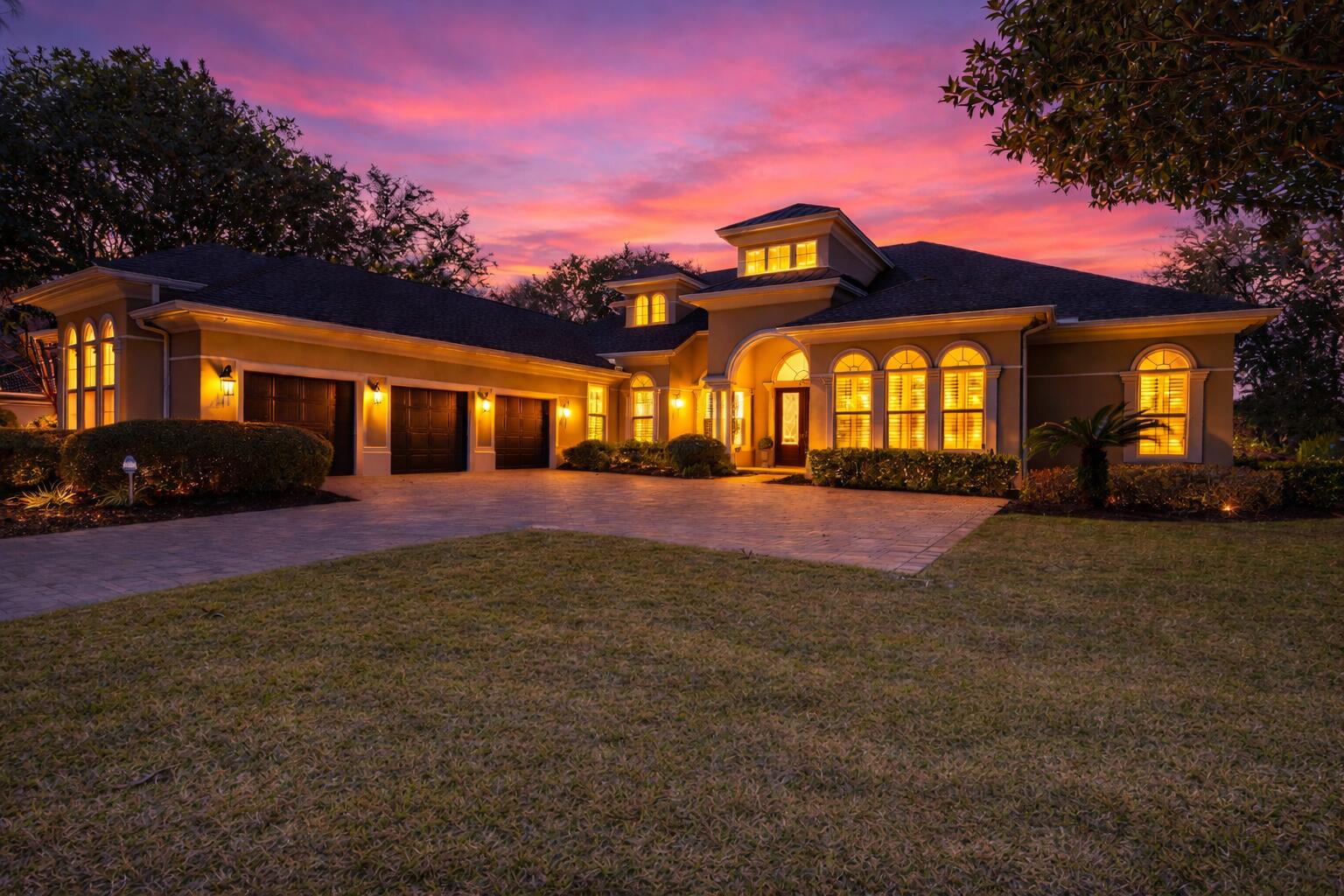 NEW PRICE IMPROVEMENT! Stunning custom home in Kelly Plantation! This spacious 5-bedroom residence, with first floor master suite, dedicated office and huge media room, offers 4,119 sq ft of beautifully designed open living space and is positioned directly on the 17th-hole tee box of the renowned Kelly Plantation Golf Course. Featuring 12-foot ceilings, abundant natural light, and plantation shutters throughout, the home feels open, refined, and welcoming. The gourmet kitchen and expansive living areas seamlessly flow for easy entertaining, while upgraded hardwood floors in the bedrooms add warmth and elegance.
New roof in 2024. New resurfaced pool and pump. Outdoors, enjoy poolside views of the course and a serene setting perfect for relaxing or entertaining.  NO FLOOD INSURANCE REQUIRED. New built in refrigerator, and freshly painted inside and out!