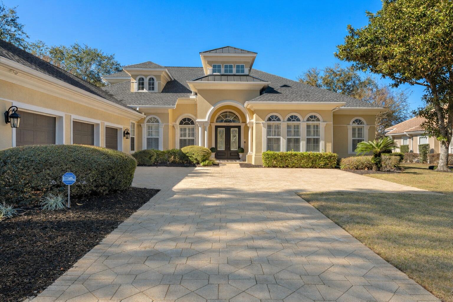Stunning custom home in Kelly Plantation! This spacious 5-bedroom residence, with first floor master suite, dedicated office and huge media room, offers 4,119 sq ft of beautifully designed open living space and is positioned directly on the 17th-hole tee box of the renowned Kelly Plantation Golf Course. Featuring 12-foot ceilings, abundant natural light, and plantation shutters throughout, the home feels open, refined, and welcoming. The gourmet kitchen and expansive living areas seamlessly flow for easy entertaining, while upgraded hardwood floors in the bedrooms add warmth and elegance.
New roof in 2024. New resurfaced pool and pump. Outdoors, enjoy poolside views of the course and a serene setting perfect for relaxing or entertaining.  NO FLOOD INSURANCE REQUIRED. New built in refrigerator, and freshly painted inside and out!