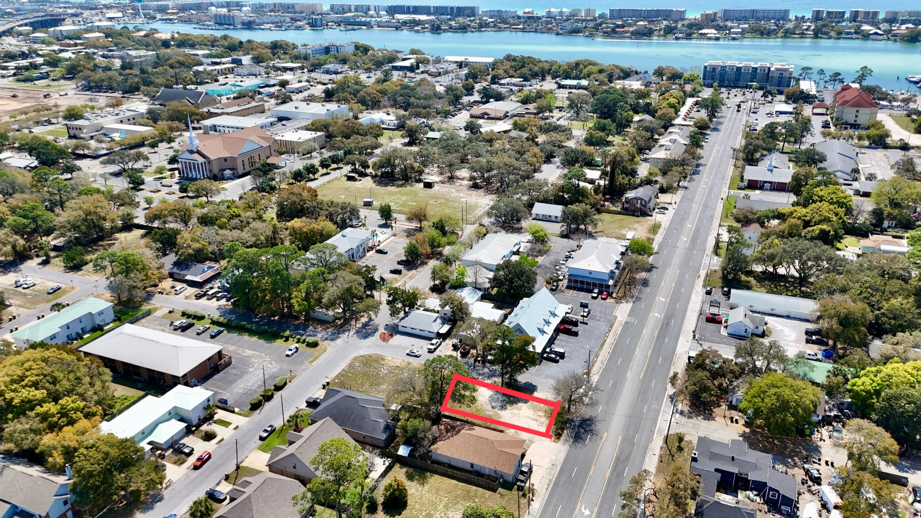 Prime Mixed-Use Development Opportunity in Fort Walton Beach! This vacant commercial/residential lot at 1 SE Birch St offers excellent visibility, convenient access to downtown, shopping, dining, and major roadways, while positioned in a growing high-demand area.
READY-TO-BUILD approved plans available for a 3-bedroom single-family home are included, making this a fantastic opportunity for investors, builders, business owners, or buyers seeking flexible development potential. Zoned for both commercial and residential use, the property offers multiple possibilities including office space, boutique retail, coffee shop, professional services, live/work concept, or residential development.
Located just minutes from Okaloosa Island beaches, Eglin Air Force Base, schools, parks, and local amenities, this property combines convenience, flexibility, and long-term growth potential. Rare opportunity to secure a strategically located lot with multiple use options in the heart of Fort Walton Beach.