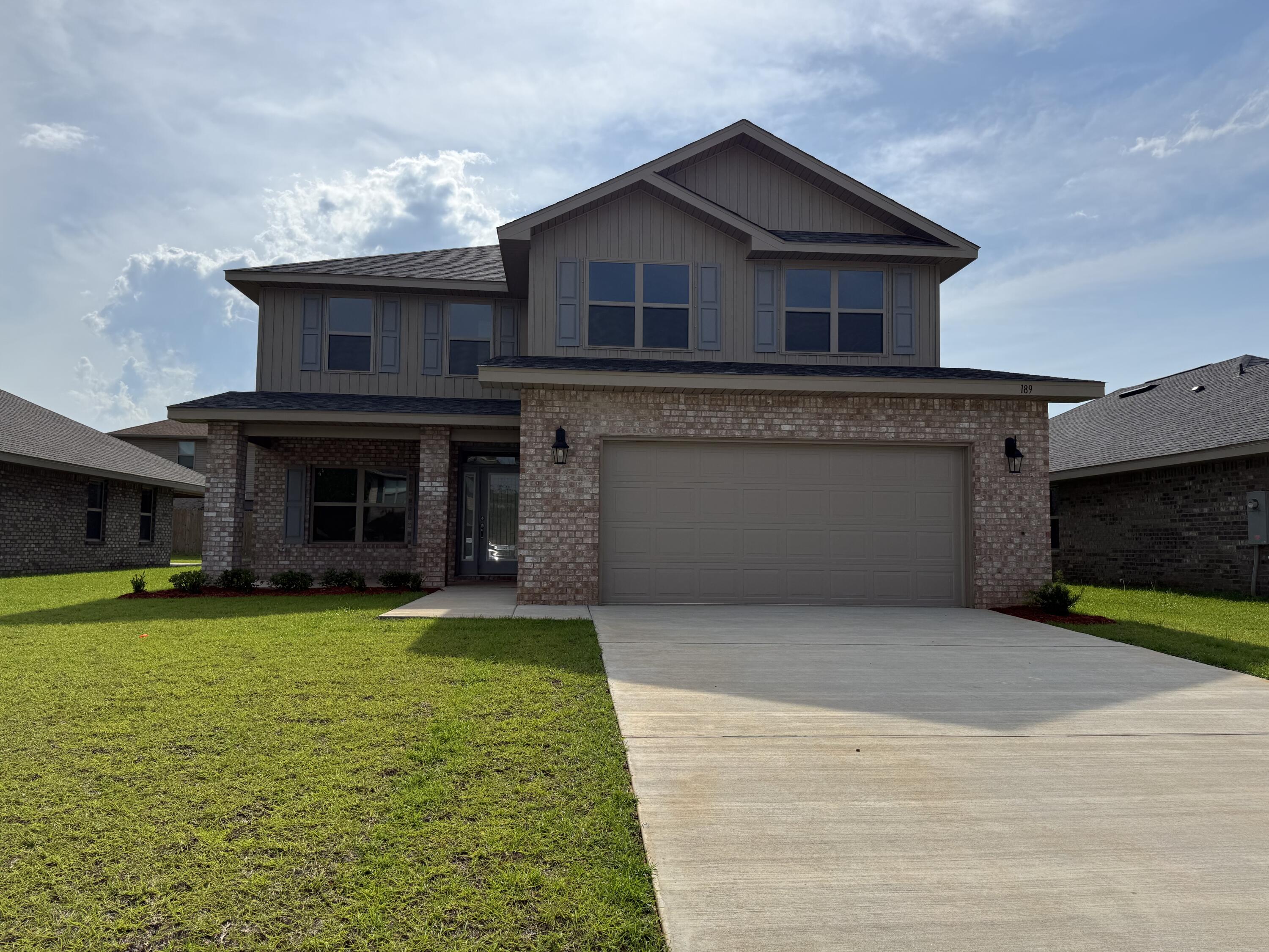 Welcome to this 4 sided brick 2 story home offering 5 bedrooms and 3.5 bathrooms! The master is on the first floor with 4 bedrooms and a bonus room on the second. This home comes with a formal dining room and a kitchen island. The countertops are granite in both kitchen and baths. The flooring throughout is durable LVP with carpet on stairs only. The master suite is spacious and the master bath comes with dual vanities, and a garden tub! The exterior is fully sodded and landscaped and irrigation is standard. This home comes with a 10 yr. Bonded Builders Warranty. Did I mention a community pool? What are you waiting foir?