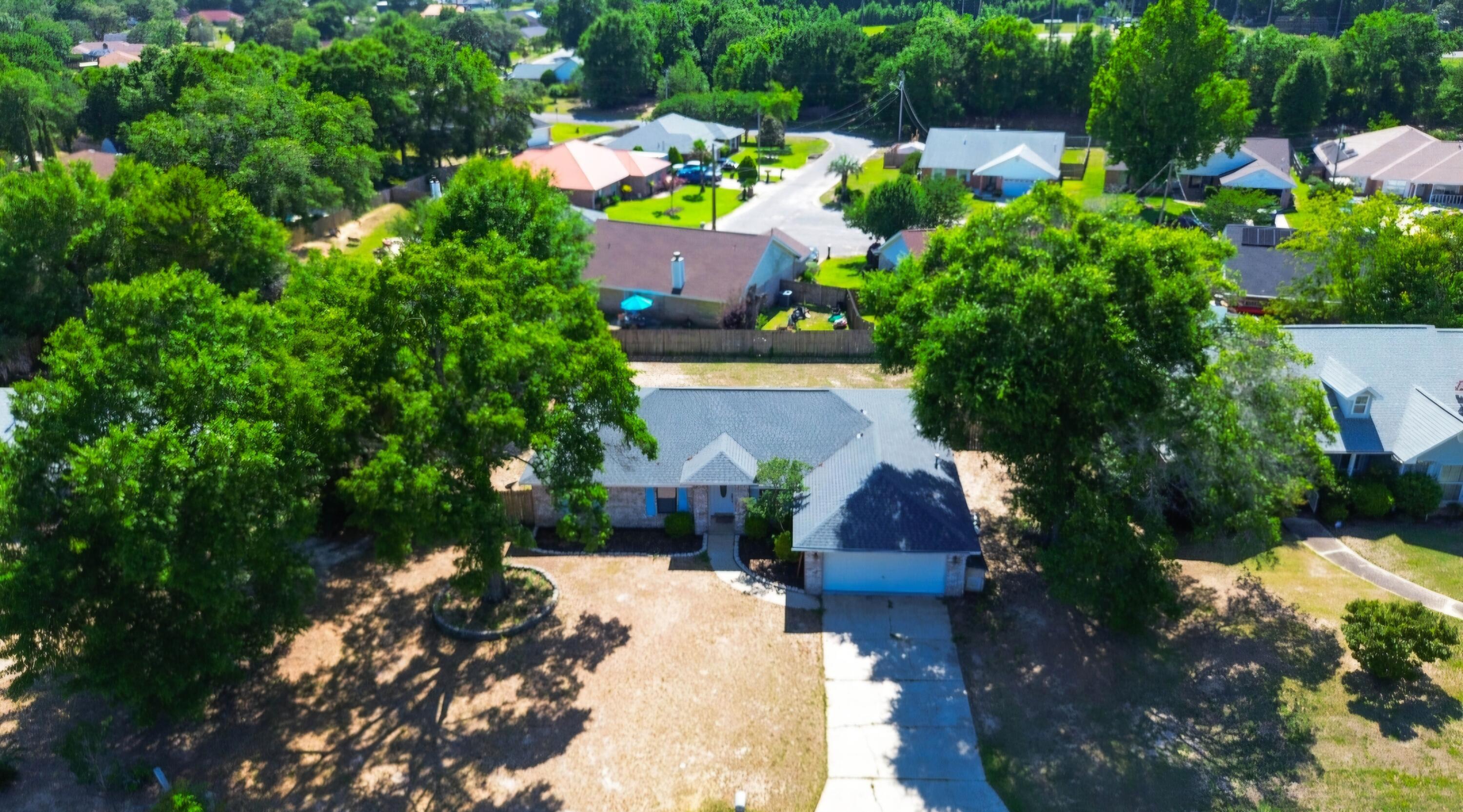 Welcome to 6073 Strickland Place, tucked away on a quiet cul-de-sac in the established Twin Oaks community of Pensacola. 
Move-in ready with newer major systems already taken care of.
This well maintained 4 bedroom, 2 bath home offers peace of mind with a 2021 roof, water heater and HVAC are 2023, public utilities, and both gas and electric are available.
Inside, you'll love the functional layout with spacious living areas, natural light, and comfortable flow for everyday living and entertaining. 
Outside you will enjoy mature trees providing shade and charm, along with a generously sized backyard offering plenty of room for your future pool, outdoor entertaining space, or garden retreat. 
Conveniently located near shopping, dining, schools, and just a short commute to NAS Pensacola, making this an ideal location for military families, first-time buyers, or anyone looking for convenience and community. 
Spend your weekends enjoying nearby white sandy beaches, local restaurants, shopping, parks, boat launches, and downtown Pensacola events.

Residents of Twin Oaks love the easy access to NAS Pensacola and Corry Station.

The garage features built-in shelving, offering excellent storage and organization space for tools, hobbies, or everyday convenience. 

For added peace of mind, an 8000KW whole-house generator will convey with the sale.

Enjoy your fully fenced backyard with pets, gatherings, gardening or creating your own private retreat. 
The double gates on both sides of the home provide easy access, with one side offering RV parking equipped with a 30-amp service outlet. 
Home has pest/termite maintenance and annual inspections on the HVAC. 

Current utilities are $130/month for electric, $80/month for water/sewer, around $4100/year for homeowner's insurance, no HOA and no flood insurance. 

If you've been searching for a clean, well-cared for home with solid major systems, outdoor space, and a great location- let's welcome you home.