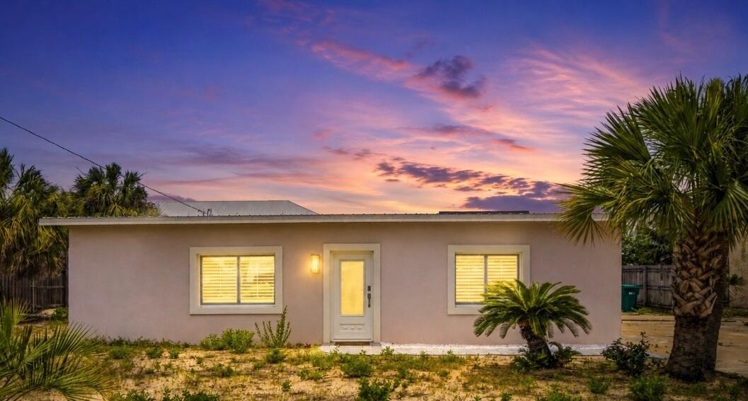 Welcome to your coastal retreat on beautiful Okaloosa Island. Ideally located just 150 yards from the sugar-white sands and emerald waters of the Gulf, this beautifully renovated beachside home offers the perfect blend of coastal living, modern comfort, and investment potential. Enjoy easy access to Downtown Fort Walton Beach, Destin, waterfront dining, shopping, entertainment, boating, and some of the Emerald Coast's most sought-after beaches. Inside, you'll find a bright and inviting open-concept floor plan designed for effortless living and entertaining. Thoughtfully updated throughout, the home features oversized tile flooring, recessed lighting, custom plantation shutters, quartzite and luxury stylish finishes that create a fresh, relaxed atmosphere. The updated kitchen serves as the heart of the home, showcasing stainless steel appliances, sleek cabinetry, a classic subway tile backsplash, and an oversized island perfect for gathering with family and friends after a day at the beach. Spacious living areas provide plenty of room to relax and entertain, while the well-appointed bedrooms offer comfortable retreats filled with natural light. Every detail has been carefully considered to create a move-in-ready coastal escape. Step outside and embrace the island lifestyle. Spend your days walking to the beach, paddleboarding, fishing, boating, dining at local seafood restaurants, or simply enjoying breathtaking Gulf Coast sunsets. The generous lot provides abundant space for outdoor entertaining, future landscaping enhancements, additional parking, or boat and RV storage.
With two bedrooms and exceptional versatility, this property is ideal as a primary residence, second home, or income-producing long-term rental. Its prime location near the beach, combined with extensive renovations and flexible outdoor space, creates lasting value and broad appeal.
Opportunities to own this close to the beach are increasingly rare. Experience the charm, convenience, and relaxed coastal lifestyle that make Okaloosa Island one of Northwest Florida's most desirable destinations.
Please note: Short-term rentals are not permitted.