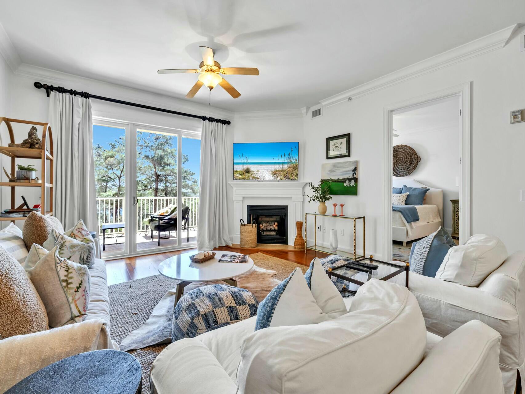 Tucked away in the exclusive gated community of Sanctuary at Redfish, this stunning condo is a hidden gem, priced below appraised value. Surrounded by nature and overlooking a rare coastal dune lake with glimpses of the Gulf, it's the perfect place to unwind. The freshly painted open-concept layout boasts a cozy gas fireplace and a spacious balcony—ideal for sipping your morning coffee or catching a breathtaking sunset.
 Resort-style amenities make every day feel like vacation, with multiple pools (one heated), hot tubs, a grilling area, garage parking, storage cages, a fire pit, lush terraces, and a fitness center. Plus, with private boat access, you can paddle out on Big Redfish Lake and explore one of the most serene coastal lakes in the world. Whether you're looking for