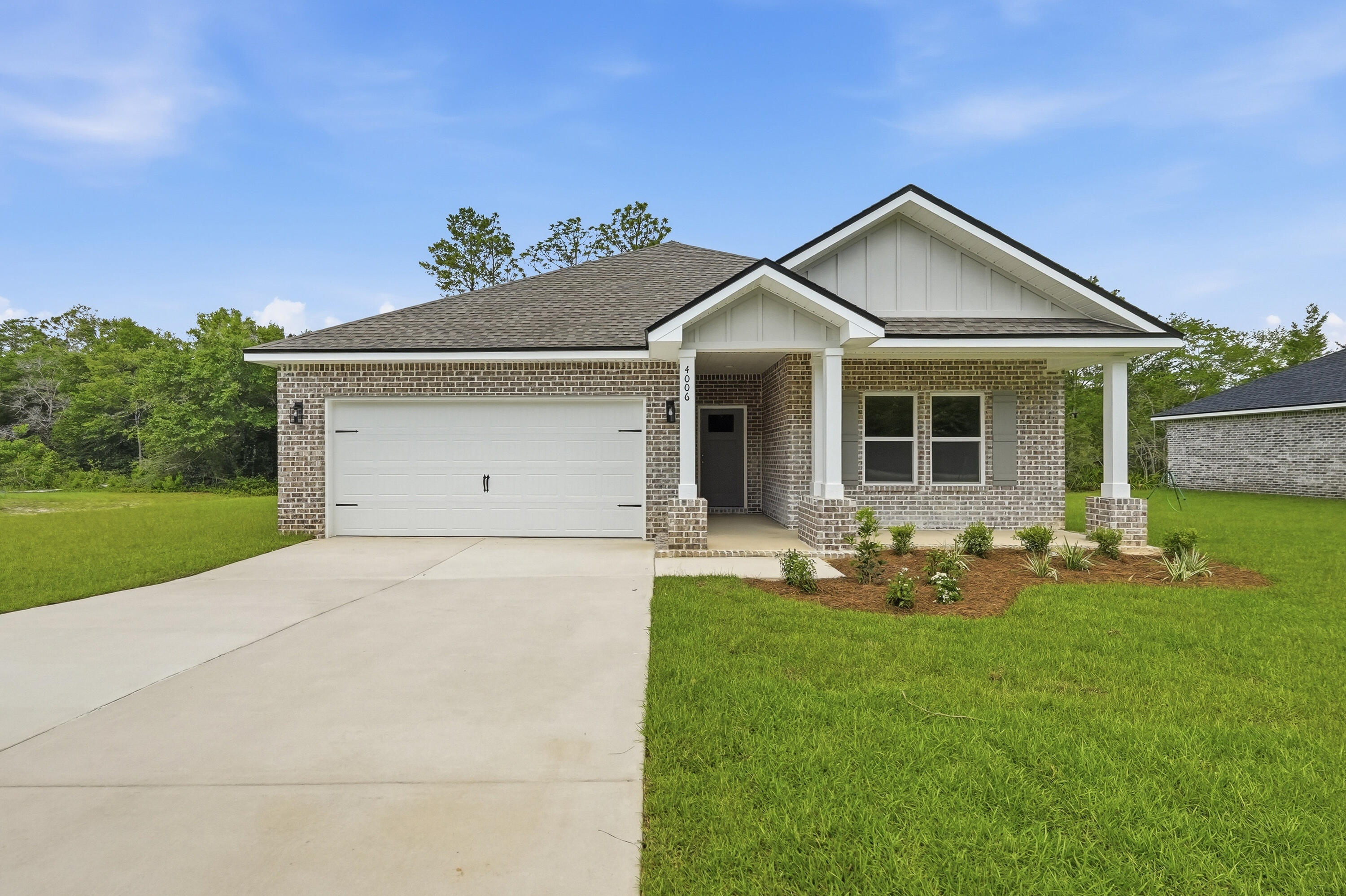 ROOM TO ROAM with 1.5 Acres! Early July completion on the 'MAYBELLE III' floor plan.  Front & back porches to relax on, all brick construction w/finished garages.  Split bedroom design, vinyl plank flooring thru-out, raised ceilings, recessed lighting, ceiling fans in all BR'S & family room.  Kitchen features work island w/bar seating, quartz countertops, cozy dining nook, corner pantry.  Owner's bath has tiled shower, double vanities, linen storage & walk-in closet.  Seller will contribute up to $10,000 towards buyers closing costs (call for details).  Photos of similar sold home - elevation, interior/exterior finishes will vary.