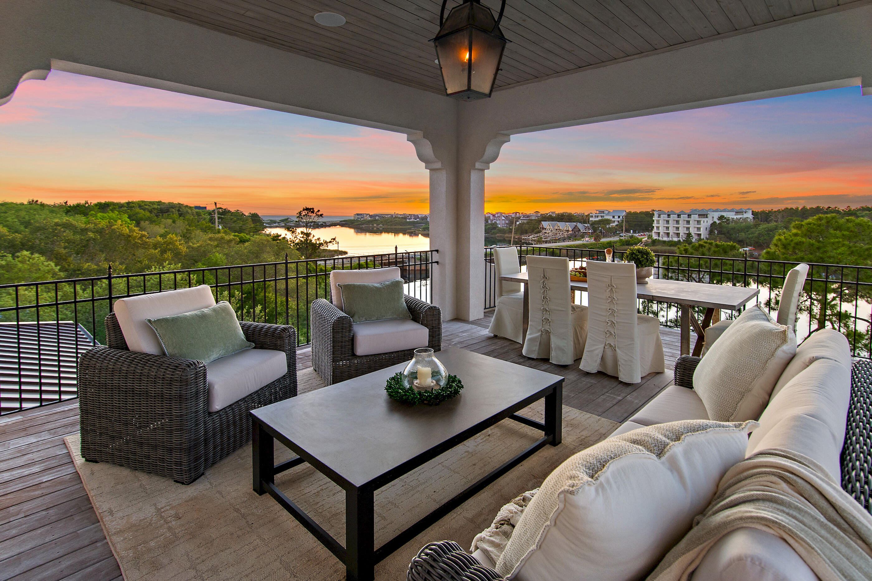 Set along the quiet waters of Camp Creek Lake, 63 S Camp Creek Road provides the epitome of the coveted 30A lifestyle shaped by water, privacy, club access, and effortless coastal living, offered complete with a credit covering the WaterSound Beach Club initiation fee with an acceptable offer. This fully furnished retreat is designed for days along the Emerald Coast: mornings on the dock, paddleboarding a coastal dune lake, boat rides to the beach, afternoons by the heated saltwater pool, and evenings as the sun sets over Camp Creek. A 2019 renovation by a renowned local custom home builder added approximately 3,800 square feet and expanded the home for modern luxury living. The home offers approximately 5,000 square feet on the main level with concrete block and ICF construction. Improvements include a new metal roof, paver driveway, updated HVAC, Ipe details, Generac generator, elevator, and three laundry areas. Inside, Carrara marble, Venetian plaster fireplace details, Wolf range, Sub-Zero refrigeration, wine room, and refined custom finishes elevate the home. This home is more than a waterfront residence; it is a private Camp Creek Lake retreat built around water, wellness, hospitality, and the ease of a club-connected 30A lifestyle. Truly turn-key, with curated decor, furnishings, and included boat, the home creates a compelling opportunity for full-time residents and investors seeking an elevated coastal retreat ready to be enjoyed from day one.