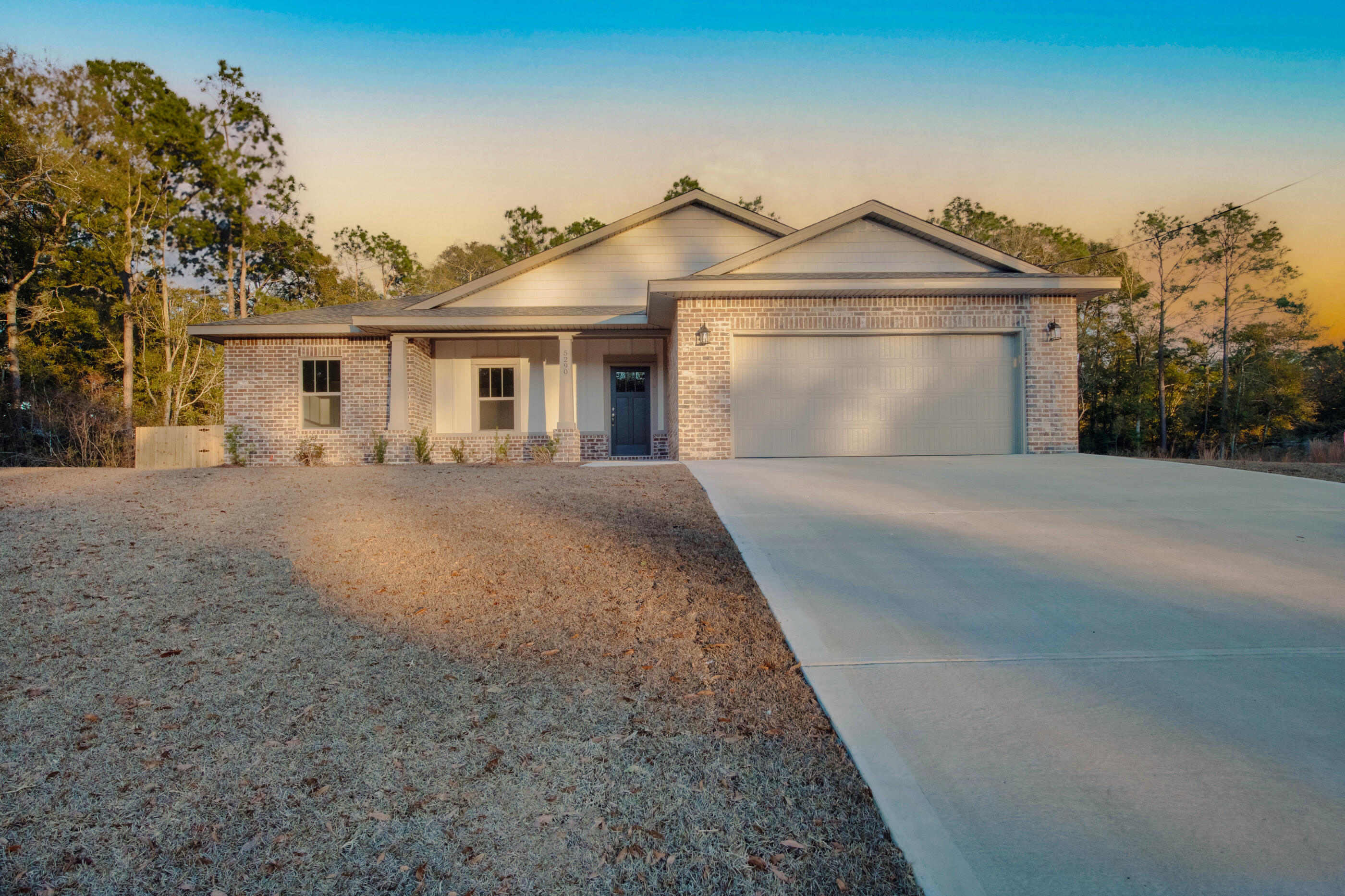 This exceptional new home features many upgrades throughout. Clad with the timeless durability of brick, cement fiber board accents, and an architectural shingled roof. Interior offers luxury vinyl plank in the common areas, visually pleasing neutral tile in the baths and laundry room, and carpet in the bedrooms. Custom paint color is accented with a wide baseboard, beautiful crown molding, and spectacular tray ceiling accents in the master bedroom, dining and entry area. Transom windows over the hall entryways provide a high-end custom touch. Stainless steel appliances including refrigerator, stunning shaker style cabinets, and granite throughout finish the home exquisitely.