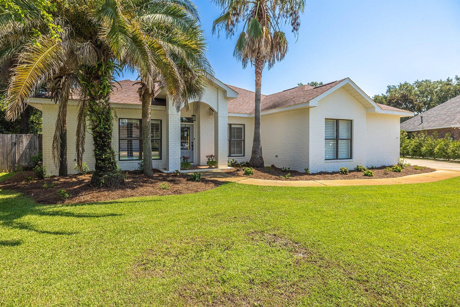 (PAID OFF SOLAR PANELS :)- Immaculate custom built home in highly desirable Tiger Trace! Built in 2005, this IS your DREAM home! Wonderful open, split floor plan that is perfect for your family and entertaining! The kitchen features a granite island, natural maple custom cabinets with a mocha wash, stainless appliances and slate tiled backsplash. The den features a gas fireplace and built-in cabinets. Master suite has an ajoining office. The large fenced in backyard has pool and covered patio. This home is everything you've been looking for! 2023 Roof, Paid Off Solar Panel, 2023 Hot Water Heater