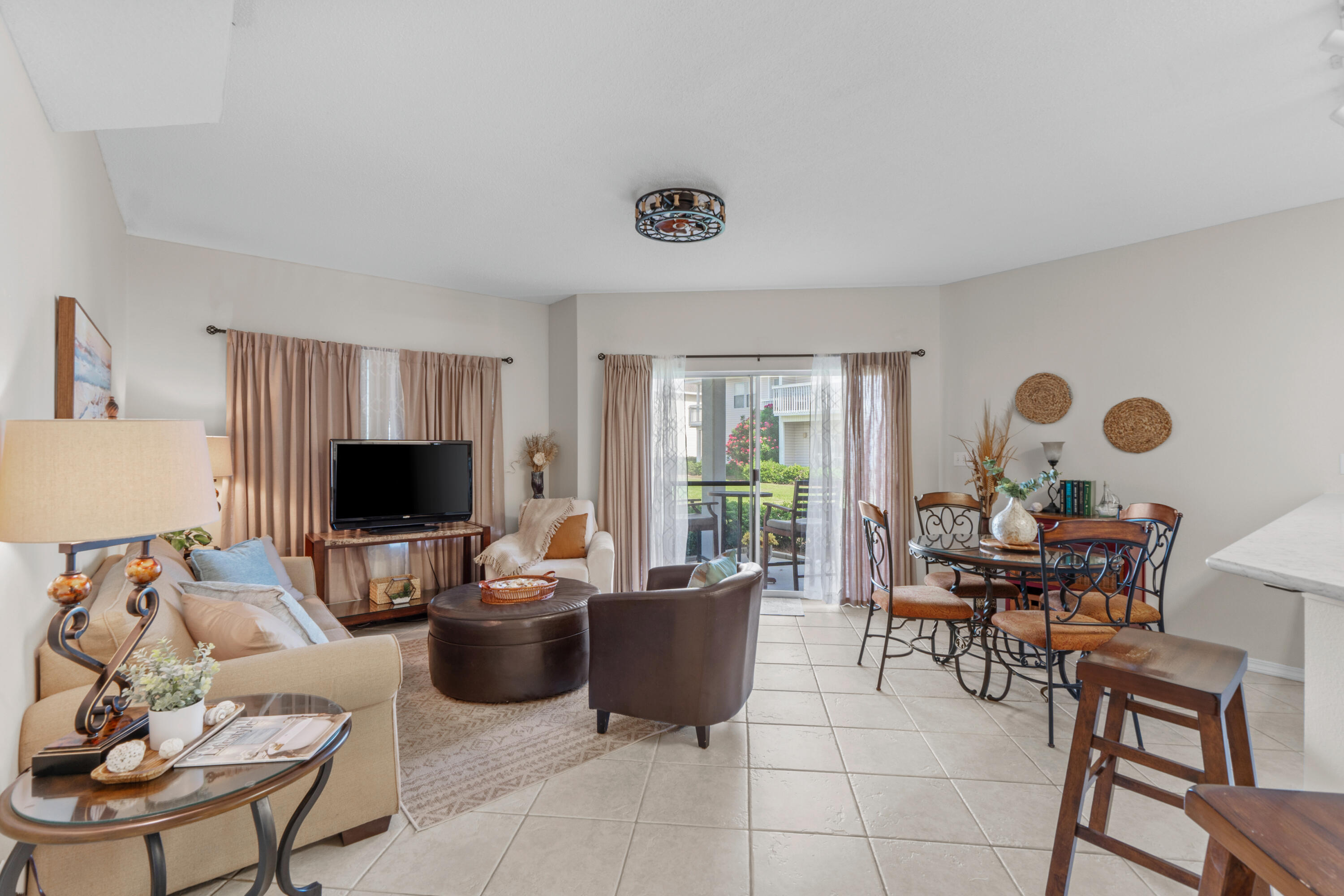 What a GEM!! 1BR/1BA Beachwalk condo with hallway bunks located on the second-floor unit features 10-foot ceilings, an open layout, updated paint, kitchen and bathroom countertops, and a comfortable coastal feel throughout. Just a short walk to Sandpiper Cove's deeded beach access and conveniently located near the 9000's community pool. This one-owner condo has been meticulously maintained and offers a great opportunity as a vacation rental, second home, or beach getaway. Sandpiper Cove amenities include deeded beach access, multiple pools, tennis, pickleball, a 9-hole par-3 golf course, marina, canal access, on-site dining, and 24-hour security. Rental projections available upon request. So many options for a turnkey vacation rental, investment property, or personal beach retreat, Sandpiper Cove Unit 9127 offers the perfect combination of location, updates, amenities and rental potential right in the heart of Destin.