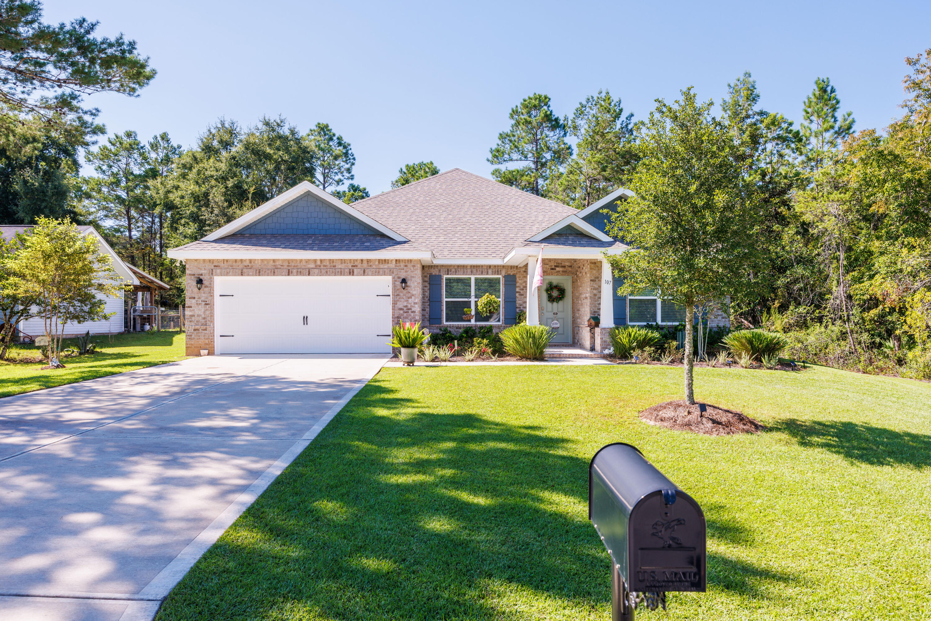 Magnificent 4 Bed/3 Bath, 2,260 sqft home constructed by Holiday Builders.  It's your dream home on. approx. 1/2 acre with a large fenced back yard with outdoor space deck & and lots or Privacy!!!  Oh..Did I mention 12x20 workshop/shed?

This home is nestled on .49 acres of beautifully landscaped land, this 2023-built home is the perfect blend of modern elegance and everyday comfort. Beyond the pristine fenced backyard, a wooded backdrop creates a sense of privacy and peace--giving you the best of both worlds: neighborhood living with a touch of nature's serenity.

Step inside and you'll immediately notice the thoughtful upgrades that set this home apart. The grand foyer opens into spacious living areas adorned with engineered Shaw Polaris Plus vinyl plank flooring,