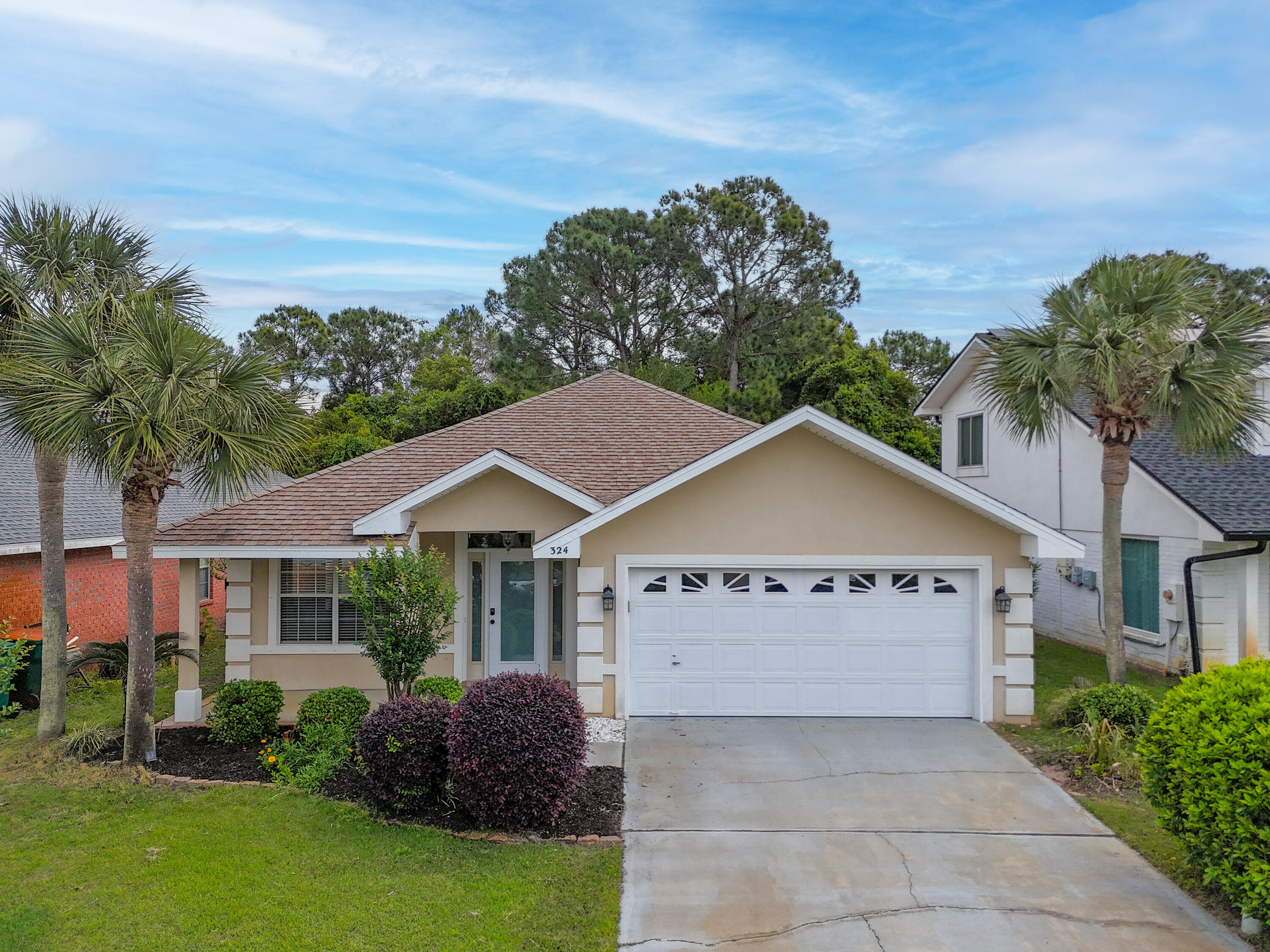 Welcome home! Located in the gated community of Emerald Lakes in the heart of Destin, this beautifully maintained, single level home offers a rare combination of functionality, comfort, and recent updates. Featuring 3 bedrooms plus a bonus room, this versatile floor plan is ideal for a variety of lifestyles, whether you need a home office, flex space, or additional living area. Recent upgrades include new kitchen countertops and new flooring, giving the home a fresh, updated feel. The open layout provides easy flow for everyday living, while the well-kept interior reflects true pride of ownership. Step outside to enjoy added privacy as the home backs up to peaceful green space, ensuring no rear neighbors. Located just minutes from Destin Commons, dining, shopping, and entertainment, this home offers both convenience and a quiet, gated neighborhood setting. Whether you're looking for a primary residence, downsizing, or a second home near the beach, this property checks all the boxes.