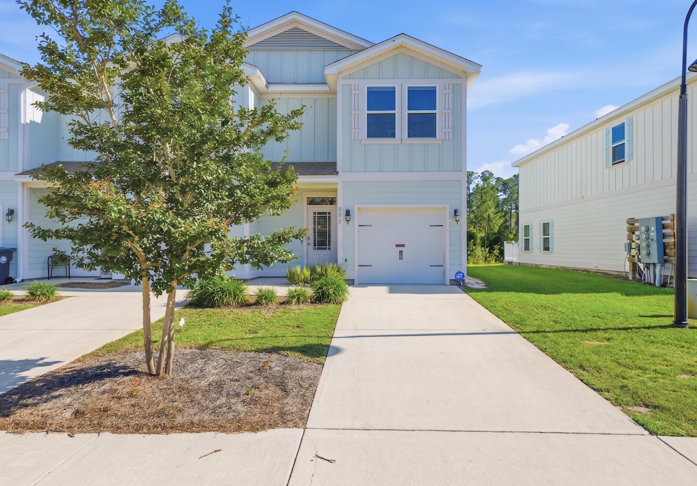 Your 30A lifestyle awaits in this beautifully maintained townhome, ideally located just a short drive from the sugar-white beaches of South Walton and within walking distance of Alaqua Unleashed Dog Park, Padgett Park, North Beach Social, nature trails, and the public library. Built in 2019, this desirable end unit stands out with a peaceful pond view and a beautiful Trex deck that provides the perfect place to relax and enjoy the tranquil surroundings.

The open floor plan features a modern kitchen with granite countertops, stainless steel appliances, and abundant cabinetry, seamlessly connecting to the living area for effortless entertaining and daily living. 

Upstairs you'll find comfortable bedroom accommodations, including a spacious master bedroom with generous closet space and a private en suite bath with walk-in shower and double vanity. The upstairs also offers a dedicated laundry area along with additional closets for storage. 

Whether you are seeking a primary residence, long-term rental investment property, or second home, this move-in ready townhome offers the best of coastal living with easy access to beaches, top-rated schools, shopping, dining, and entertainment. Schedule a showing today!