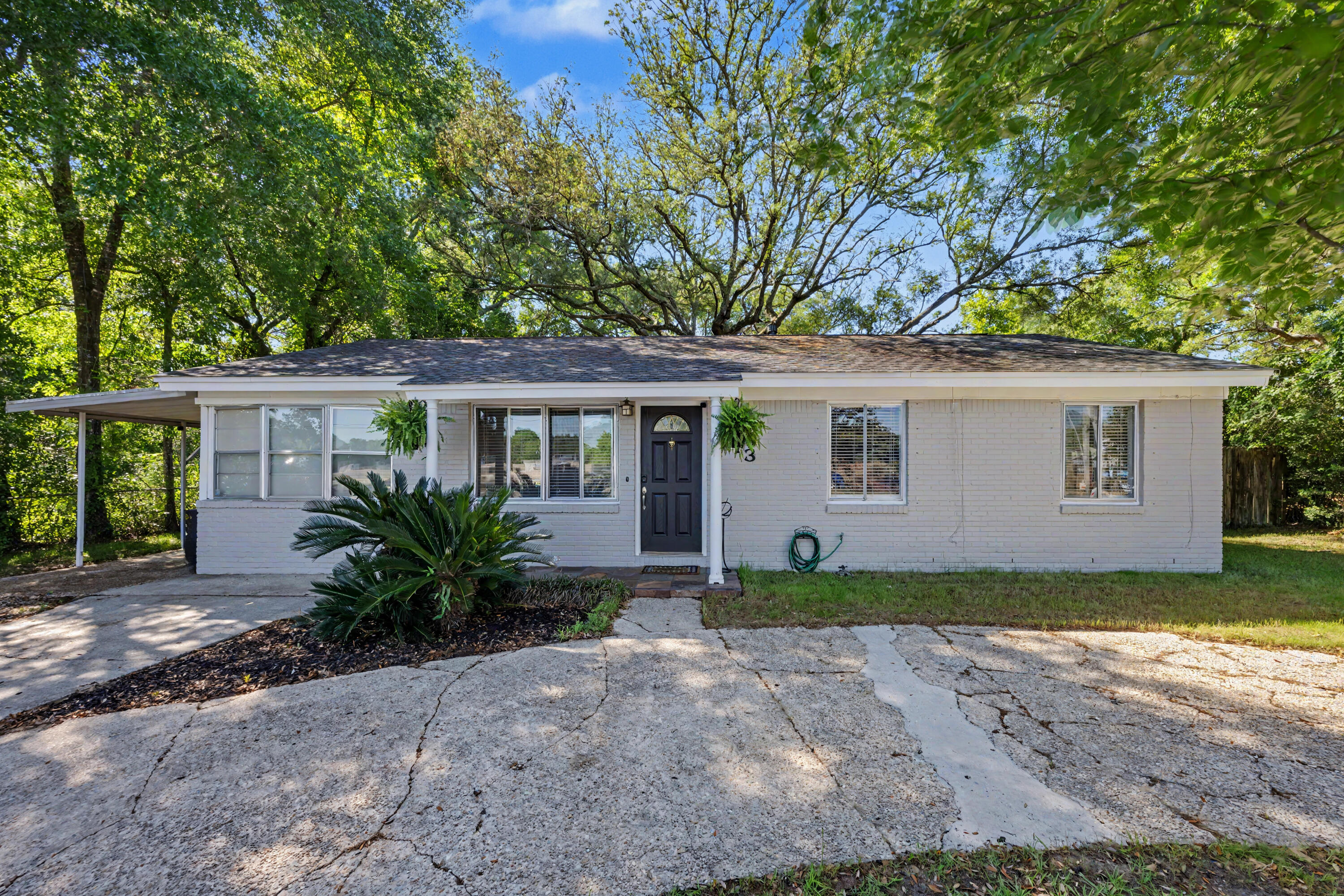 Charming 3-bedroom, 1.5-bath all-brick home situated on a spacious, tree-shaded lot in the heart of Valparaiso! This property offers a unique blend of character, functionality, and opportunity with commercial zoning and flexible living spaces throughout. Inside, you'll find fresh interior paint, updated bedroom fixtures, tile flooring in several areas, and a spacious family room that provides plenty of room for everyday living or entertaining. The kitchen features abundant wood cabinetry, ample counter space, stainless steel appliances, and recessed lighting.

Recent updates include a roof replaced in 2021, HVAC replaced in 2020, fresh exterior paint, and a pool pump replaced in 2023 for added peace of mind. The home also includes a separate storage room, perfect for hobbies, storage, workshop space, or additional flex use. Step outside to enjoy the oversized backyard with mature trees, a private in-ground pool, and plenty of room to entertain or relax. Conveniently located near Eglin AFB, shopping, dining, schools, and just a short drive to the beaches, this property offers endless potential in a prime location.