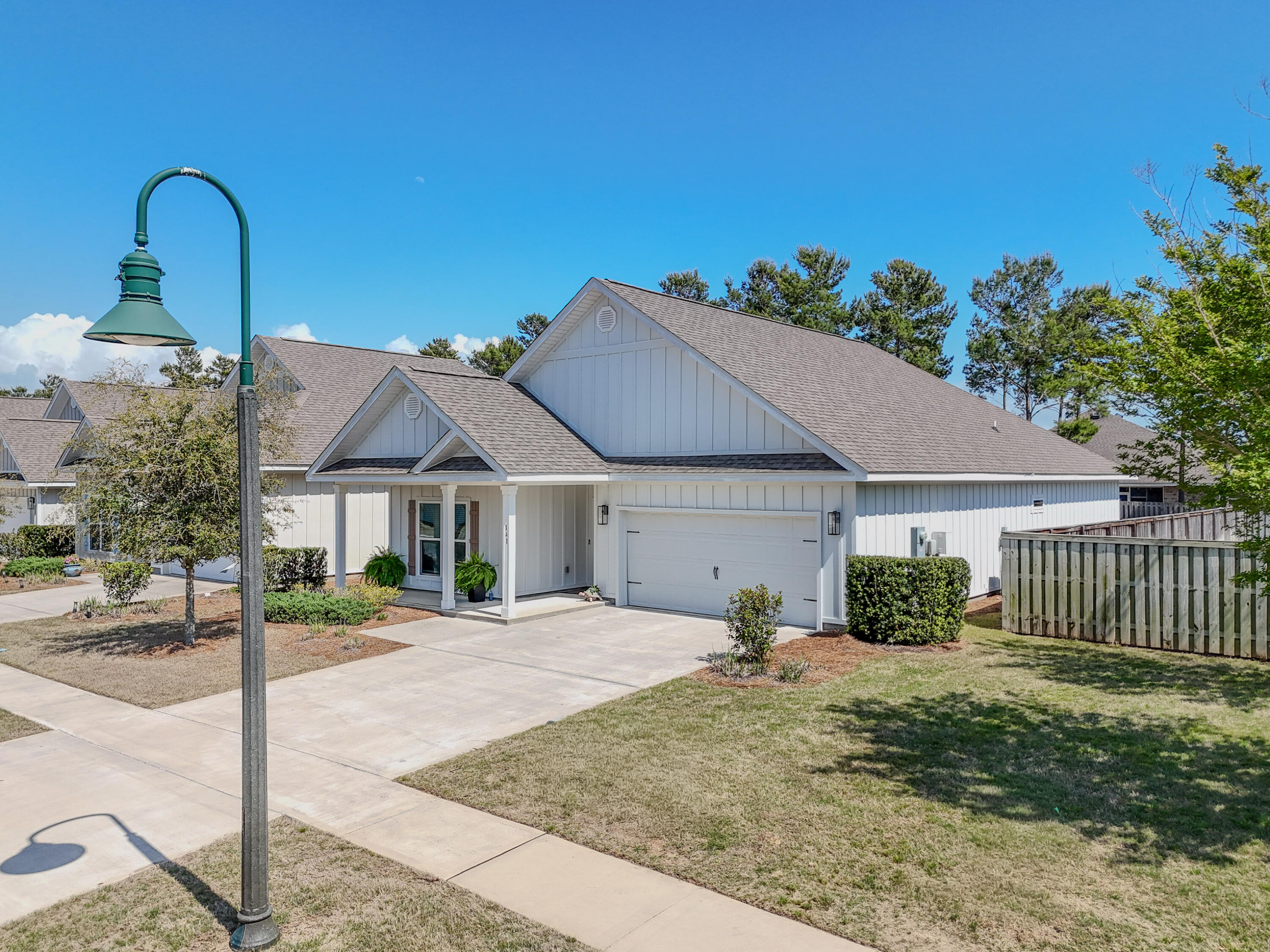 Home is under contract with a home sale contingency and kickout clause in place. Allowing showings and accepting backup offers. Low-maintenance living, privacy, and a like-new home--this one is a must-see. Welcome to 141 Lightning Bug Ln in the gated Firefly neighborhood of Hammock Bay. This gently lived-in home offers a spacious, thoughtfully designed layout that feels inviting from the moment you step inside. Enjoy added privacy with no neighbors behind the home, as it backs up to a peaceful preserve--creating a quiet, natural setting right in your backyard. Inside, you'll find 9-foot ceilings throughout, with crown molding accents in the main living area and primary bedroom for an elevated touch.  The primary suite offers a private ensuite bath and two walk-in closets, giving you both comfort and plenty of storage. Step outside to a fully fenced backyard designed for relaxation, complete with a rear gate that provides direct access to a scenic trail leading to a wooded area--perfect for enjoying the outdoors.

Living in Firefly means truly low-maintenance living, with landscaping included in the HOA, along with access to a private pool, clubhouse, and pickleball courts--all just a short walk away.

If you've been looking for easy living in a gated community with privacy and convenience, this home is one you'll want to see.